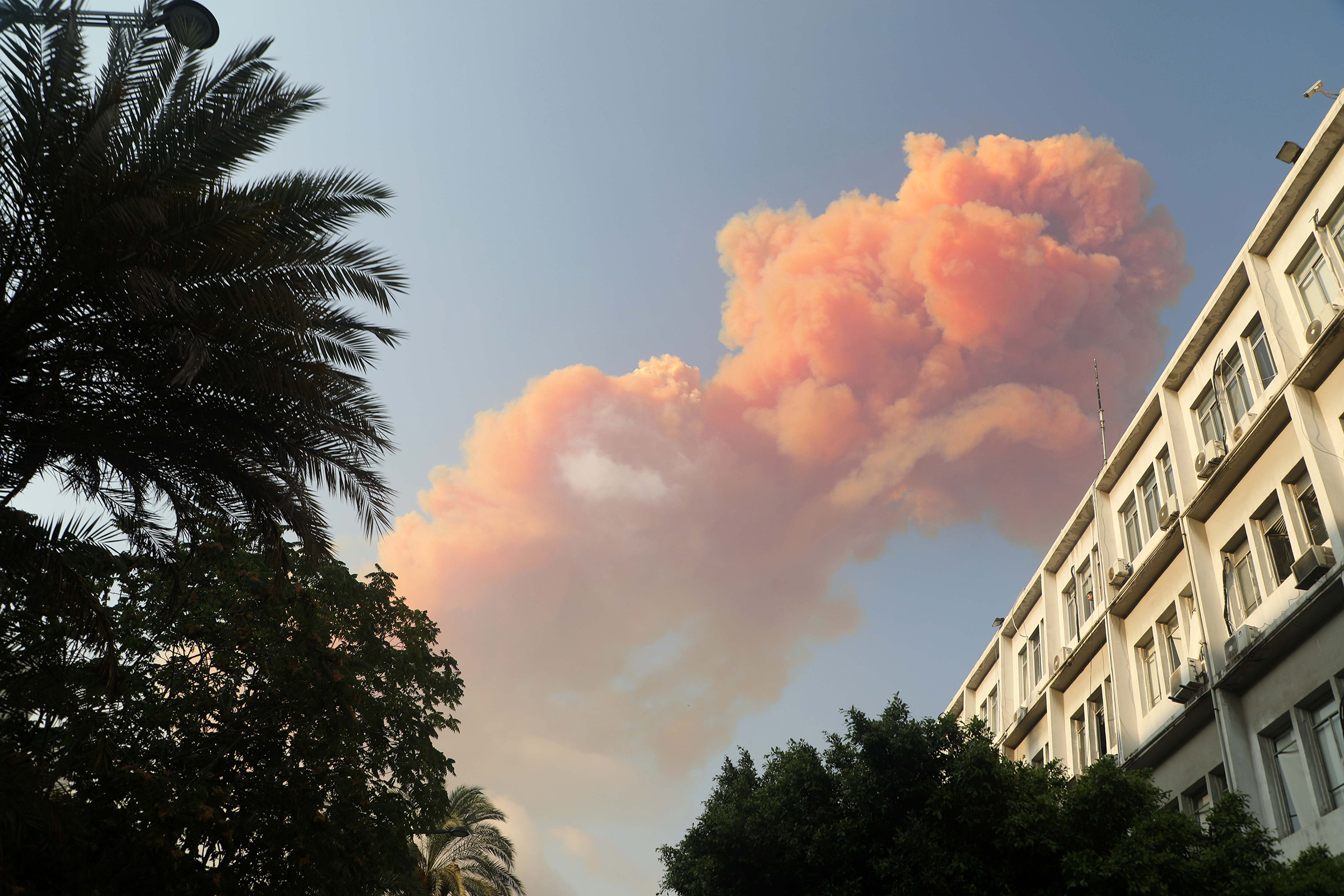 Pink smoke rises following the explosion. (Bilal Jawich—Xinhua/Sipa USA)