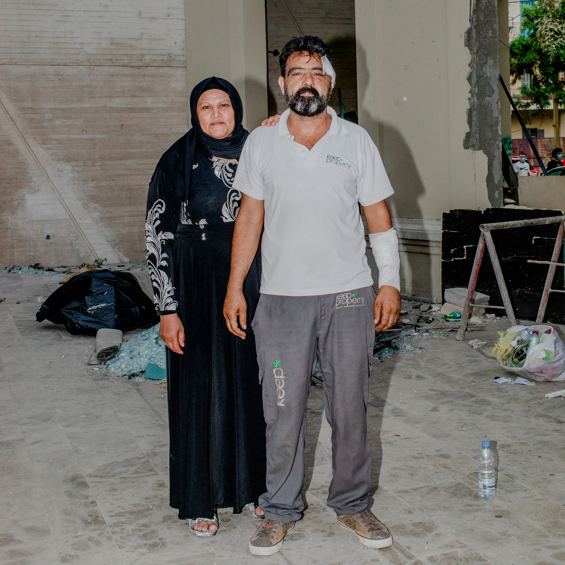 Riad Hussein Al Hussein and his wife Fatima Al Abid in the Mar Mikhael neighborhood of Beirut on Aug. 7. He was buying vegetables there three days earlier when he heard a small explosion. He asked the seller whether he thought it was a shell or a bomb, and where it had landed. "Our discussion lasted approximately one minute and was interrupted by another sound of explosion, one way louder,” he recalls. “I shouted and said we needed to hurry inside the shop, and that is when I was hit by the glass." He later went back to the building where he was injured to assist with cleaning up. "I wanted to help like I had been helped," he said. "I wanted to pay it forward."