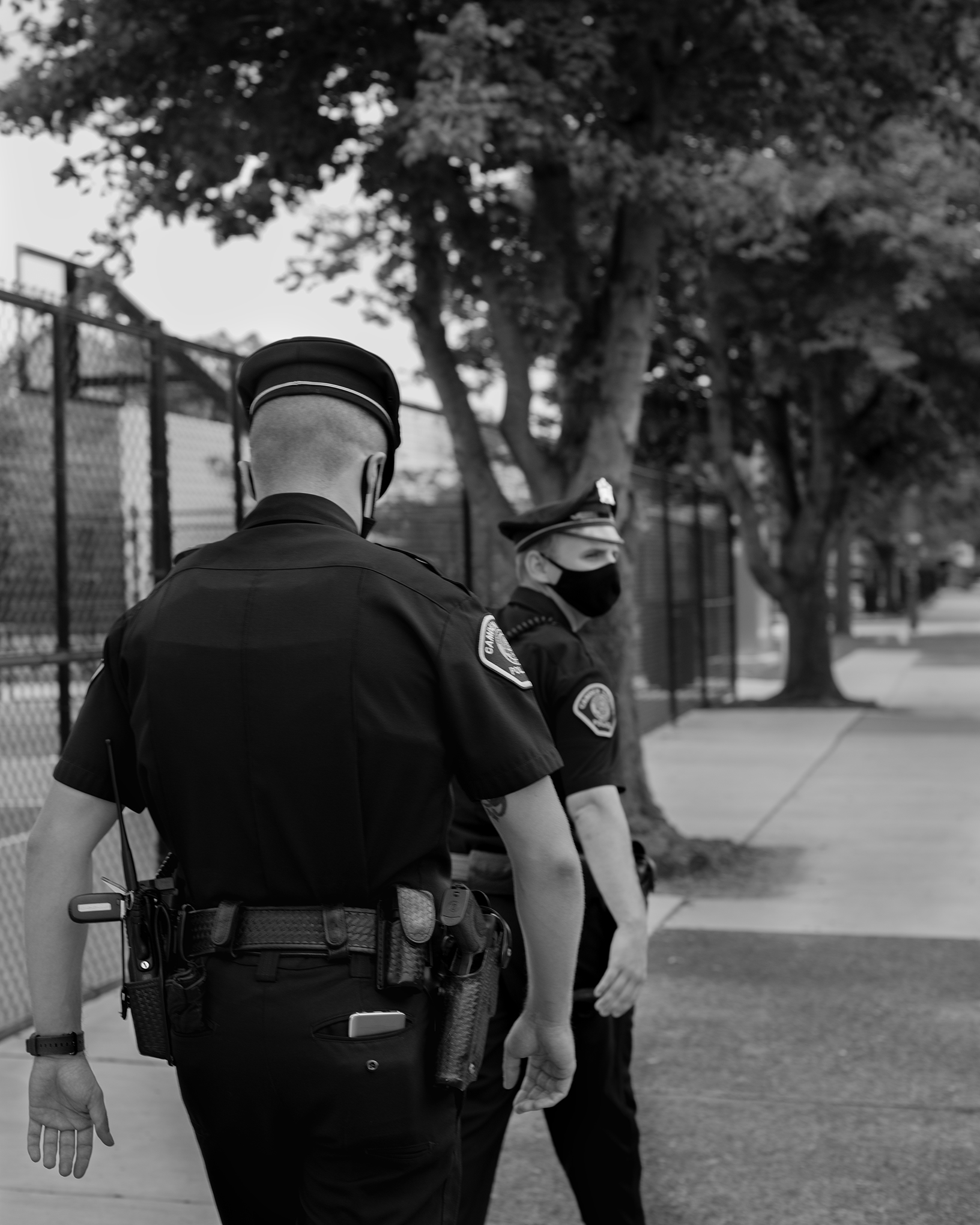 In 2013, when the Camden Police department relaunched under county control, it had two main objectives: reduce the crime rate, and make citizens feel safer. Above, two officers patrol the streets of the city on July 17. (Widline Cadet for TIME)