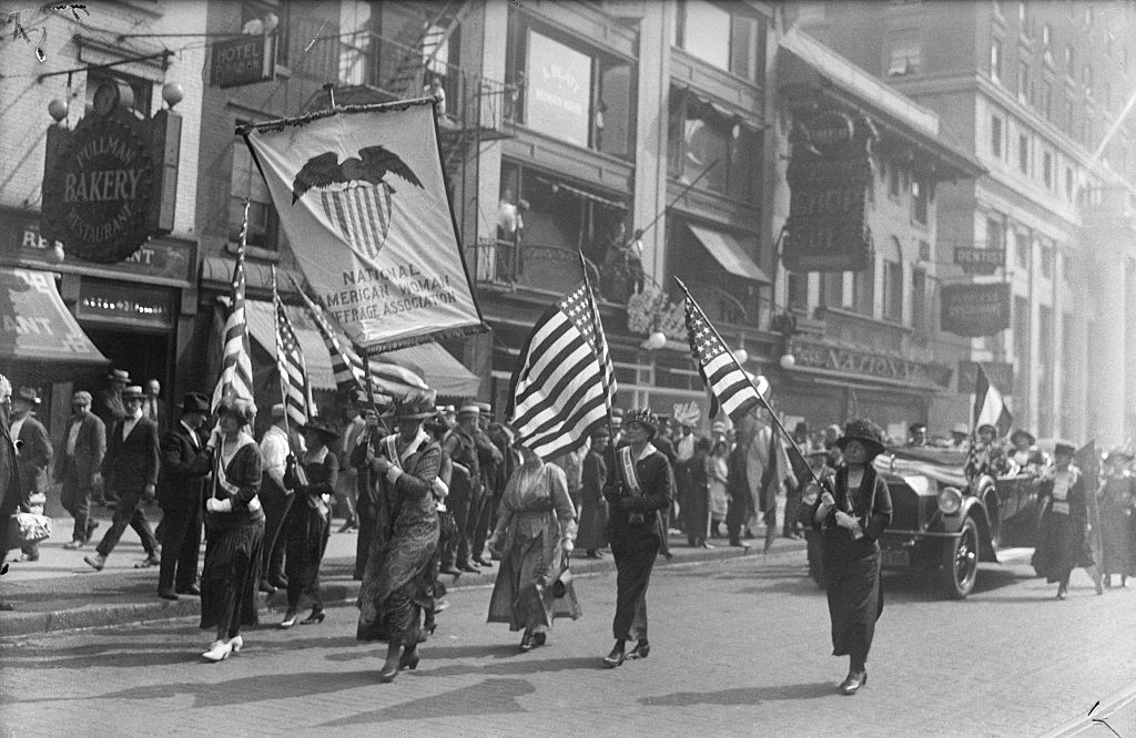 Members of the National American Woman Suffrage Association marching from Pennsylvania Terminal to their headquarters on Aug. 28, 1920, after welcoming home Carrie Chapman Catt, president of the Association, on her arrival from Tennessee. (Bettmann Archive)