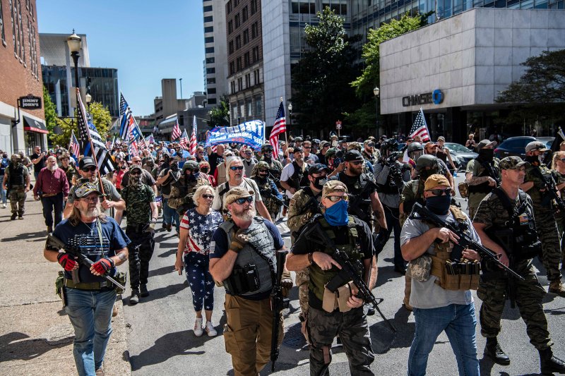 Armed pro-trump militia members during a demonstartion on the day of the Kentucky Derby in Louisville, Ky., September 5, 2020.