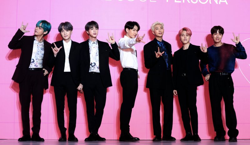 Members of South Korean K-Pop group BTS appear during a press conference in Seoul, South Korea, on April 17, 2019.