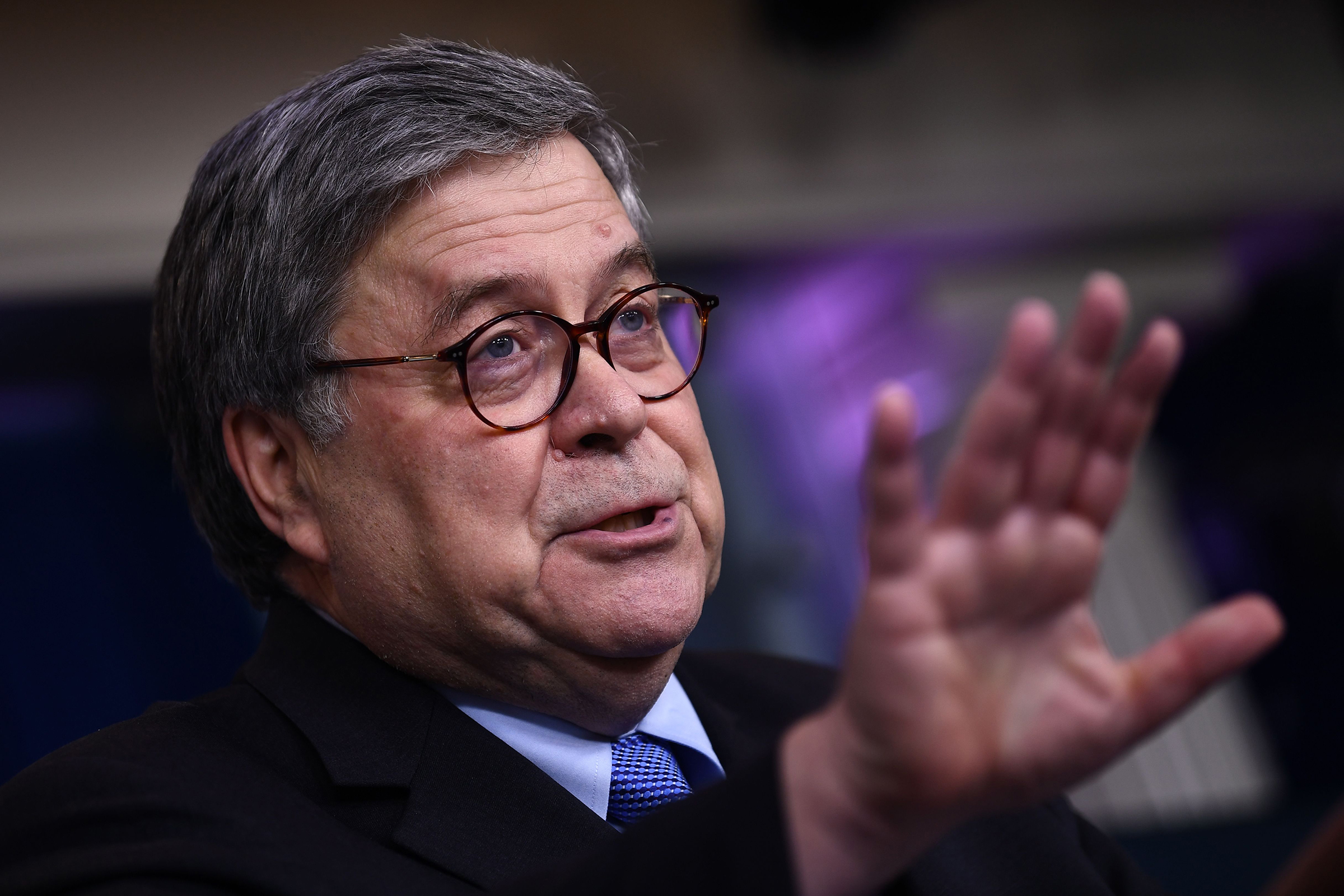 US Attorney General William Barr gestures as he speaks during a daily briefing at the White House in Washington D.C. on March 23, 2020. (Brendan Smialowski—AFP via Getty Images)
