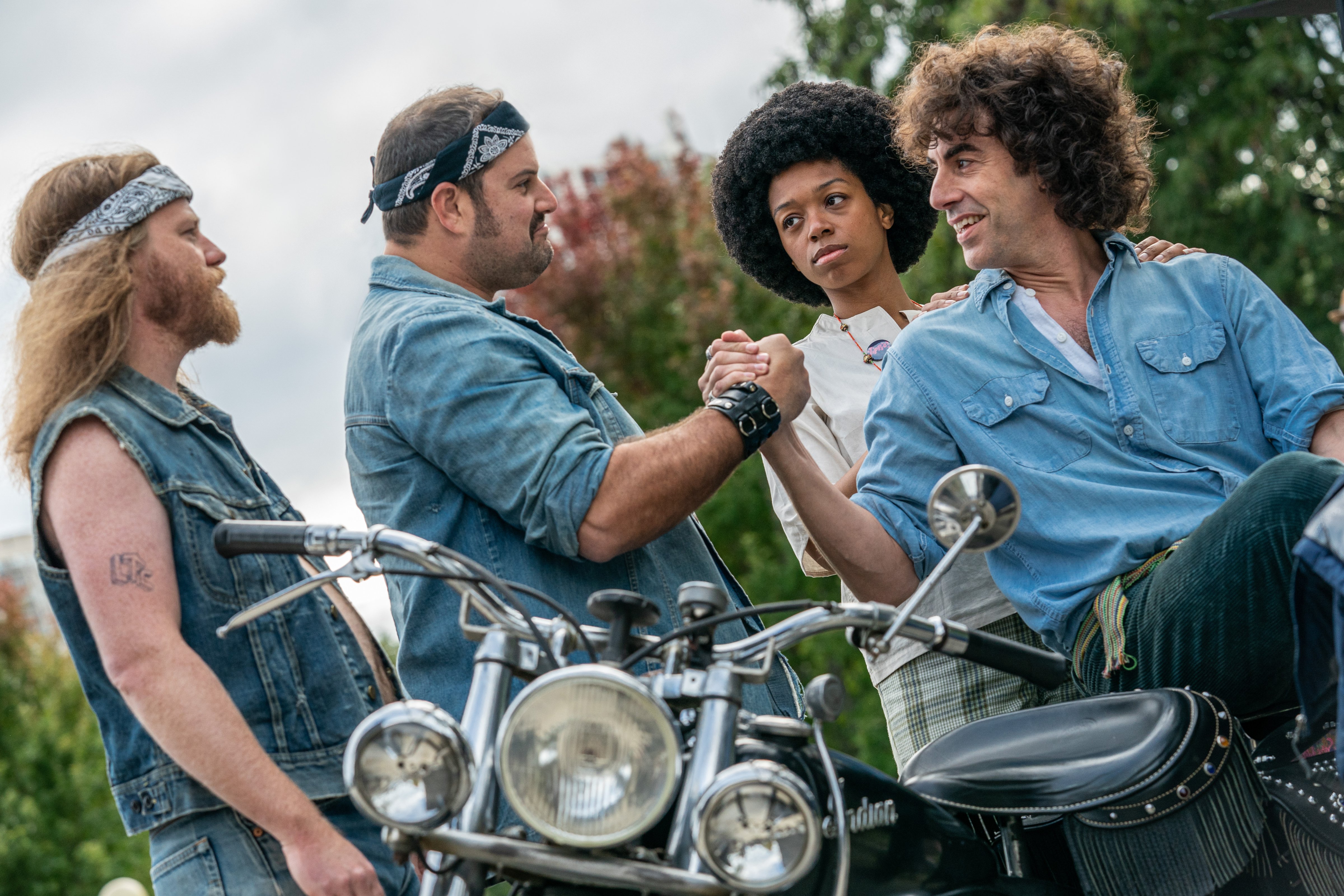 Sacha Baron Cohen, right, plays Abbie Hoffman in The Trial of the Chicago 7. (NIKO TAVERNISE/NETFLIX—© 2020 Netflix, Inc)