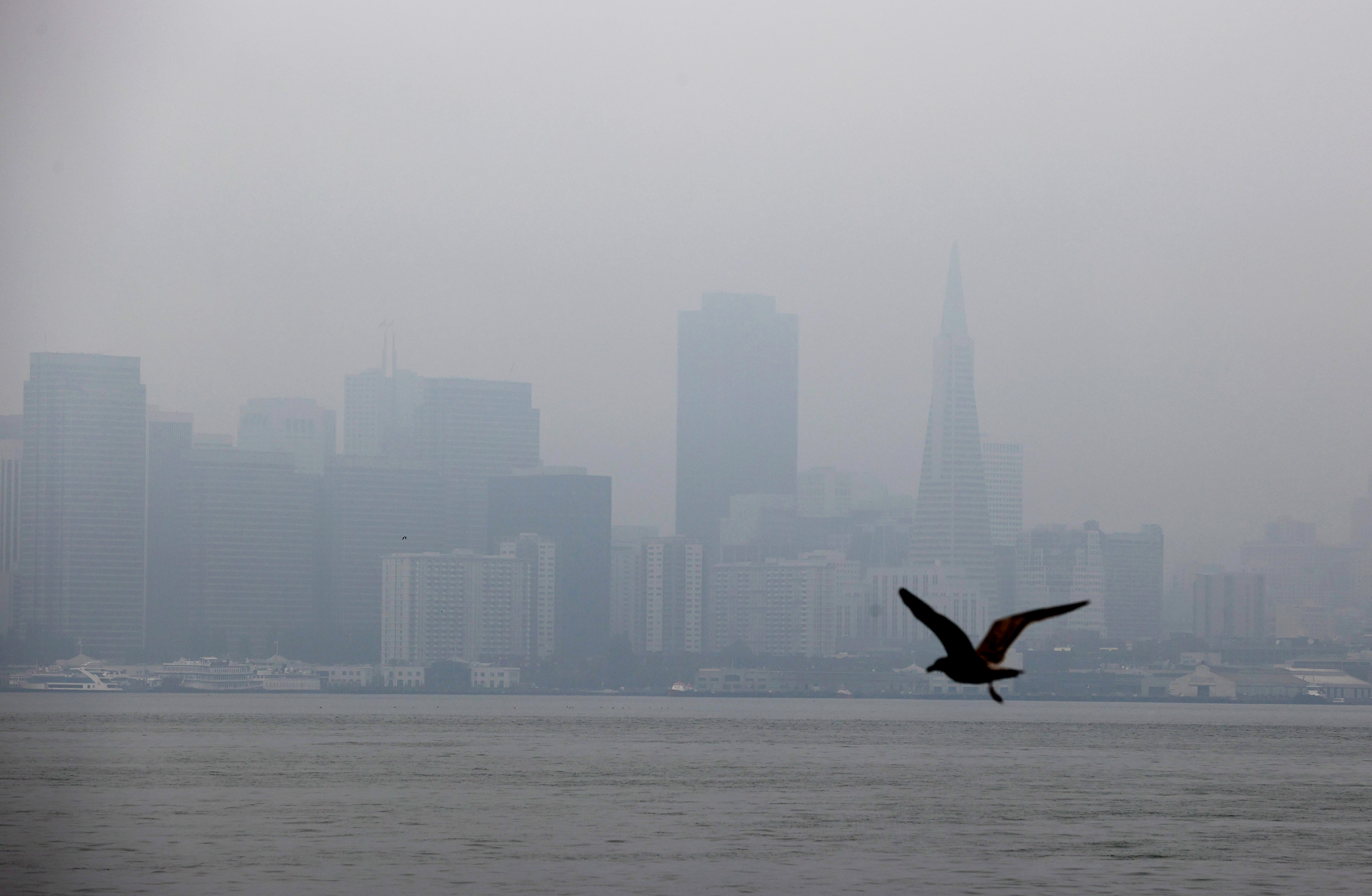 The San Francisco skyline is barely visible through hazy and smoky conditions on Sept. 3, 2020, due to smoke from wildfires raging in California. (Justin Sullivan—Getty Images)