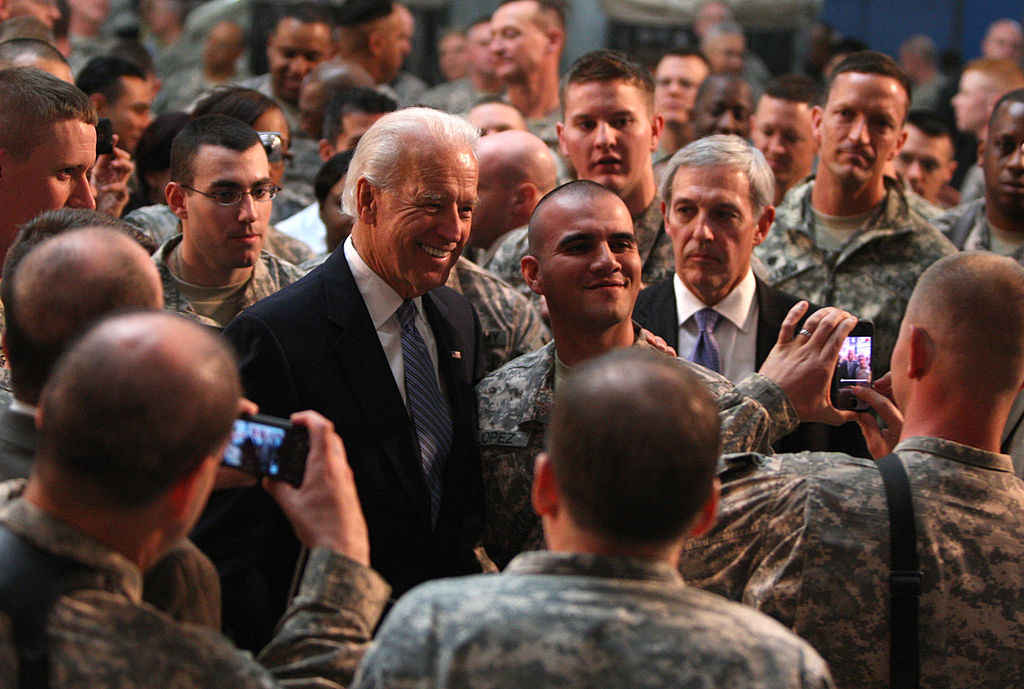 Then US Vice President Joe Biden meets with US soldiers at Baghdad's Camp Victory on January 13, 2011. (Ahmad al-Rubaye—AFP/Getty Images)