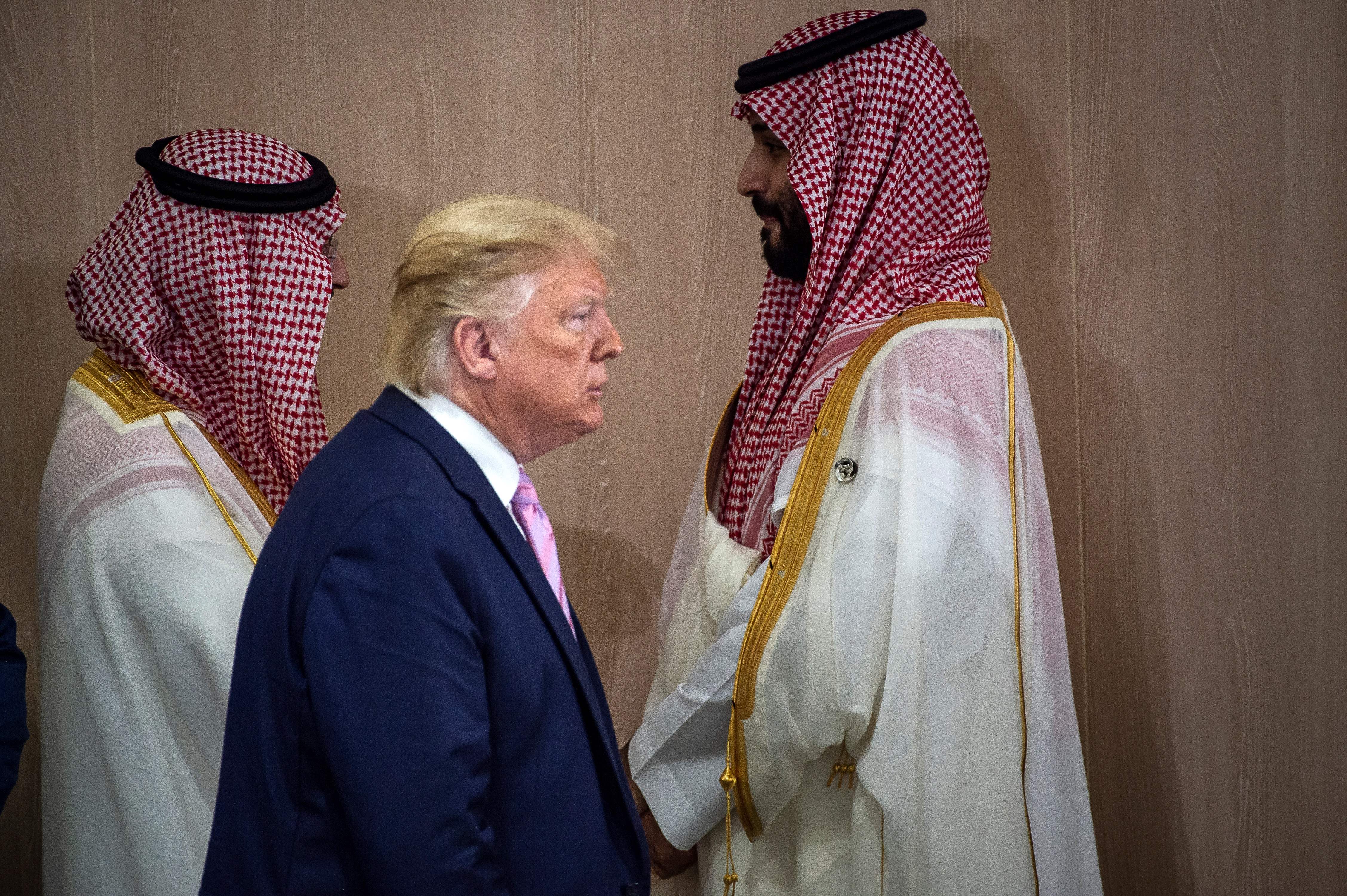US President Trump and Saudi Arabia's Crown Prince Mohammed Bin Salman arrive for a meeting on "World Economy" at the G20 Summit in Osaka on June 28, 2019. (Eliot Blondet—AFP/Getty Images)