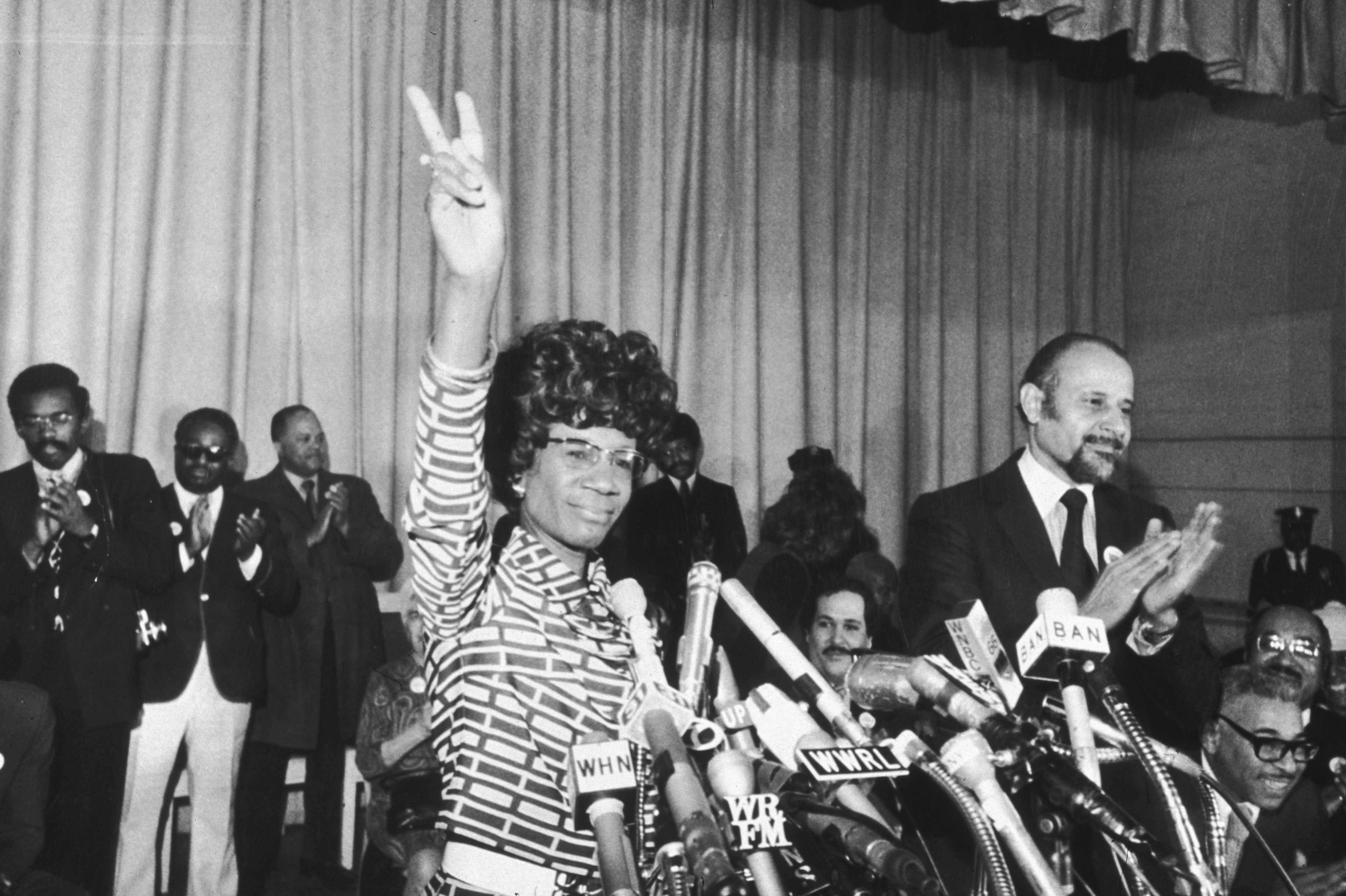 25th January 1972: US Representative Shirley Chisholm of Brooklyn announces her entry for Democratic nomination for the presidency, at the Concord Baptist Church in Brooklyn, New York. Manhattan borough president Percy Sutton applauds at right. (Photo by Don Hogan Charles/New York Times Co./Getty Images) (Getty Images)