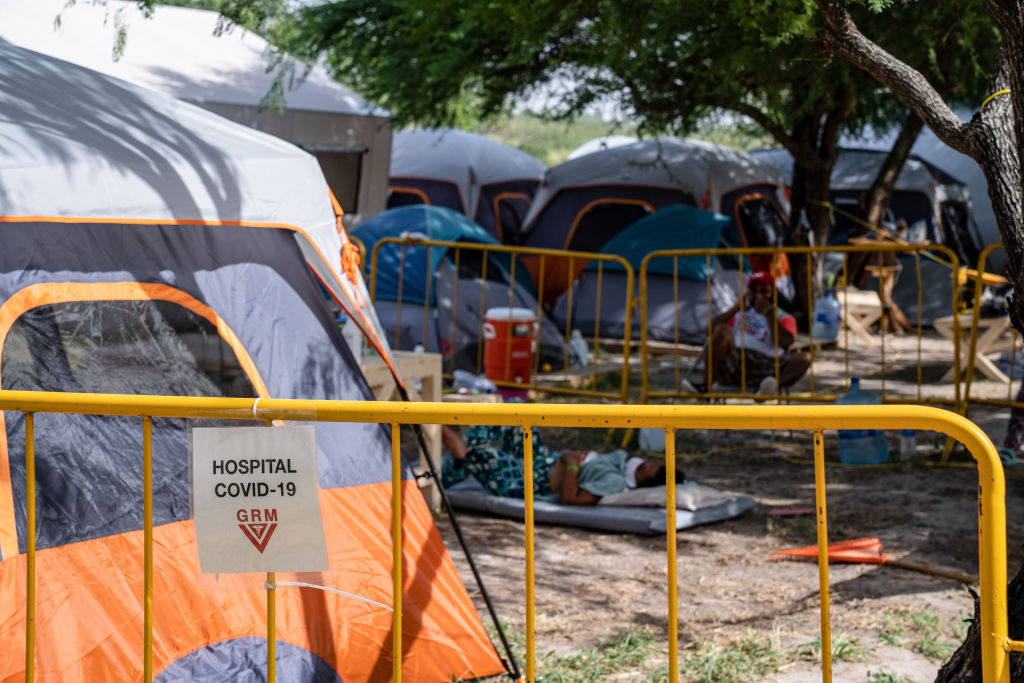 A sign demarcating the edge of the isolation area at the Matamoros tent encampment for asylum seekers on July 13, 2020. (Lexie Harrison-Cripps/SOPA Images/LightRocket via Getty Images)