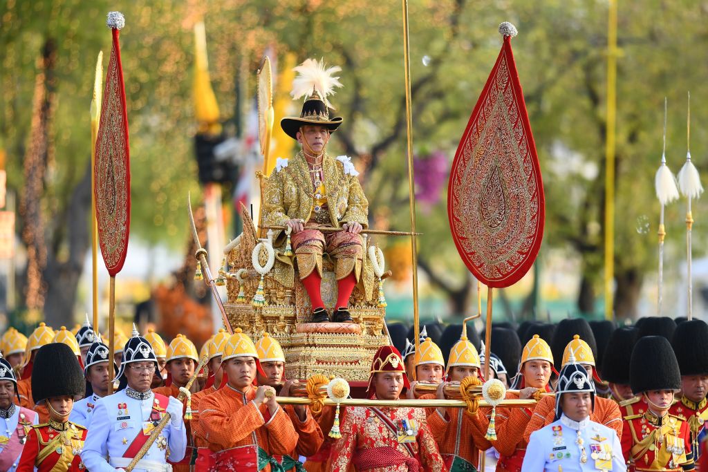 Thailand's King Maha Vajiralongkorn is carried in a golden palanquin during the coronation procession in Bangkok on May 5, 2019. (MANAN VATSYAYANA—AFP/Getty Images)