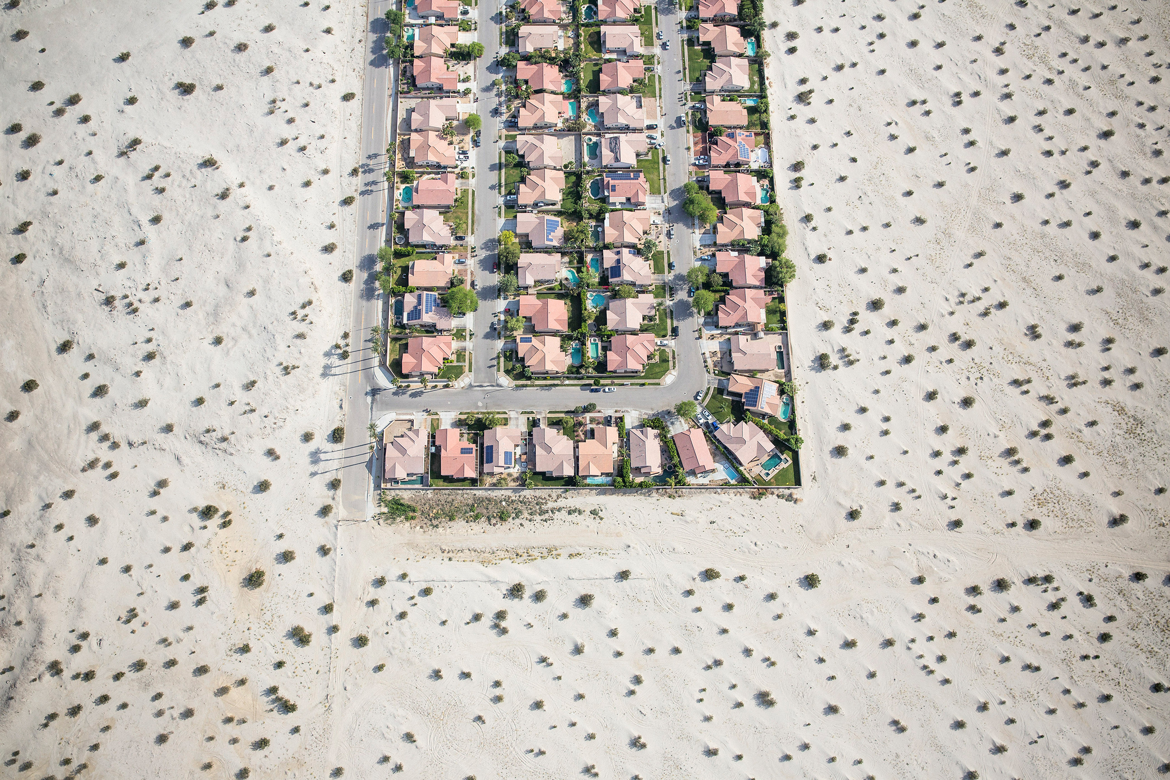 A housing development on the edge of undeveloped desert in Cathedral City, Calif.