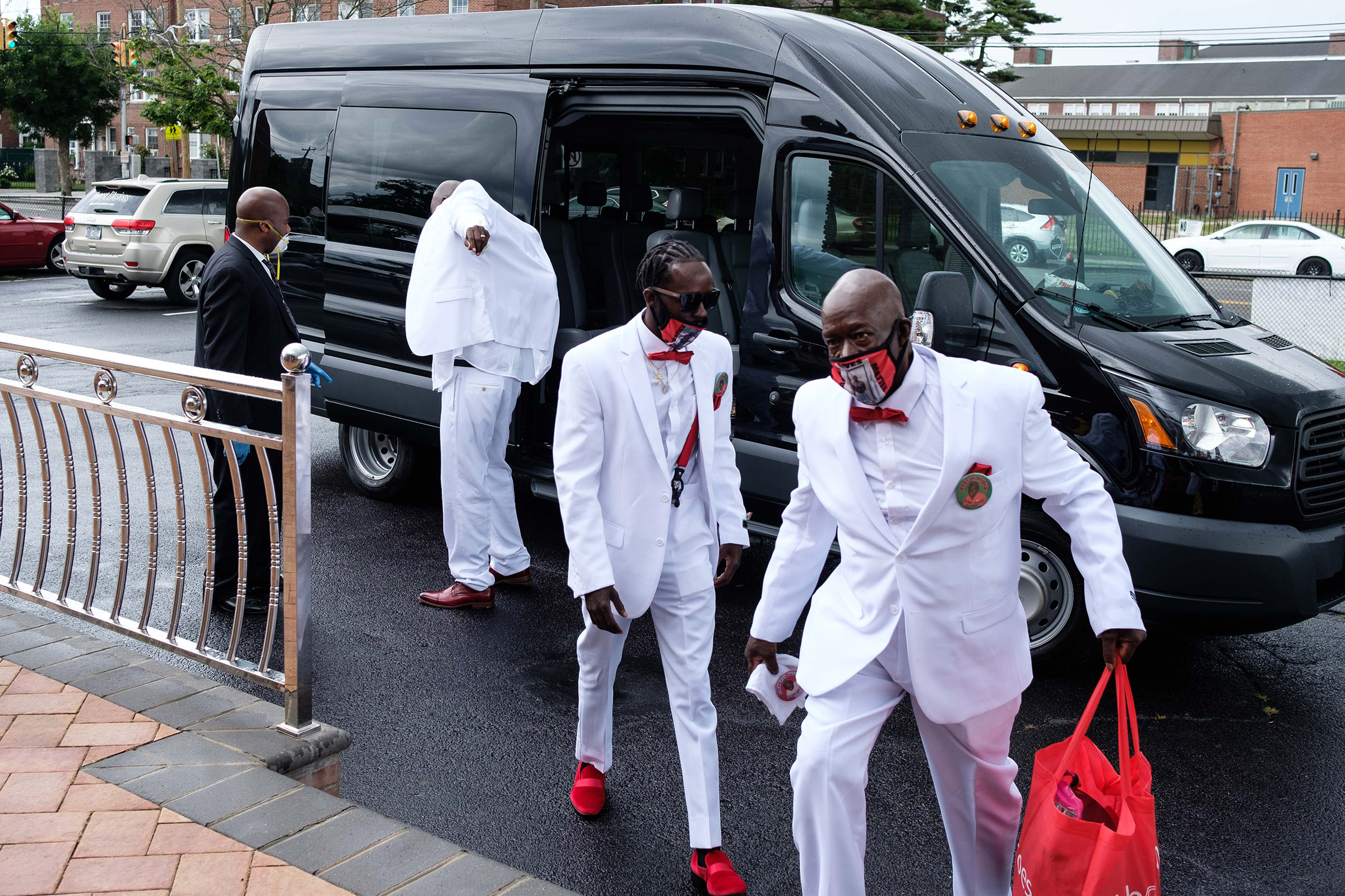Jamel Floyd’s father and brothers arrive at Judea United Baptist Church for Jamel's funeral in Hempstead, N.Y., on June 30. (Yuki Iwamura)