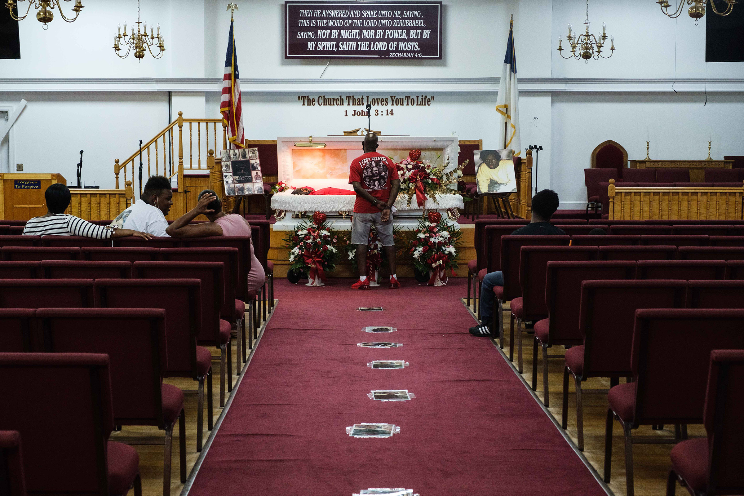 James Floyd, Jamel Floyd’s father, looks over his son's body during the wake at Judea United Baptist Church in Hempstead, N.Y., on June 29. (Yuki Iwamura)