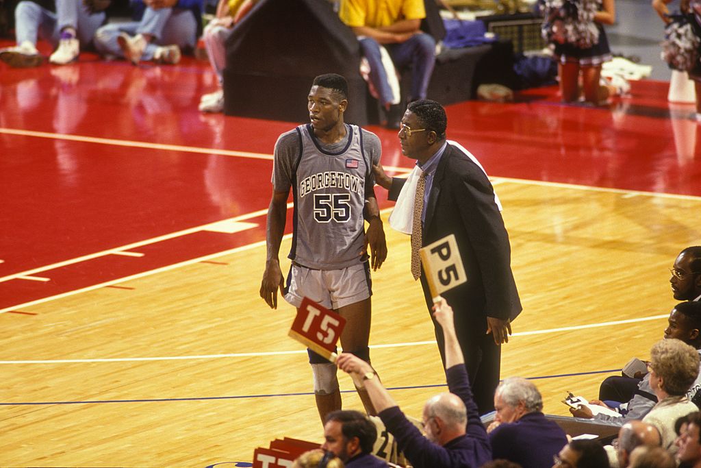John Thompson, head coach of the Georgetown Hoyas, and Dikembe Mutombo during a game on Dec. 15, 1991 at Capitol Centre in Landover, Maryland. (Mitchell Layton–Getty Images)