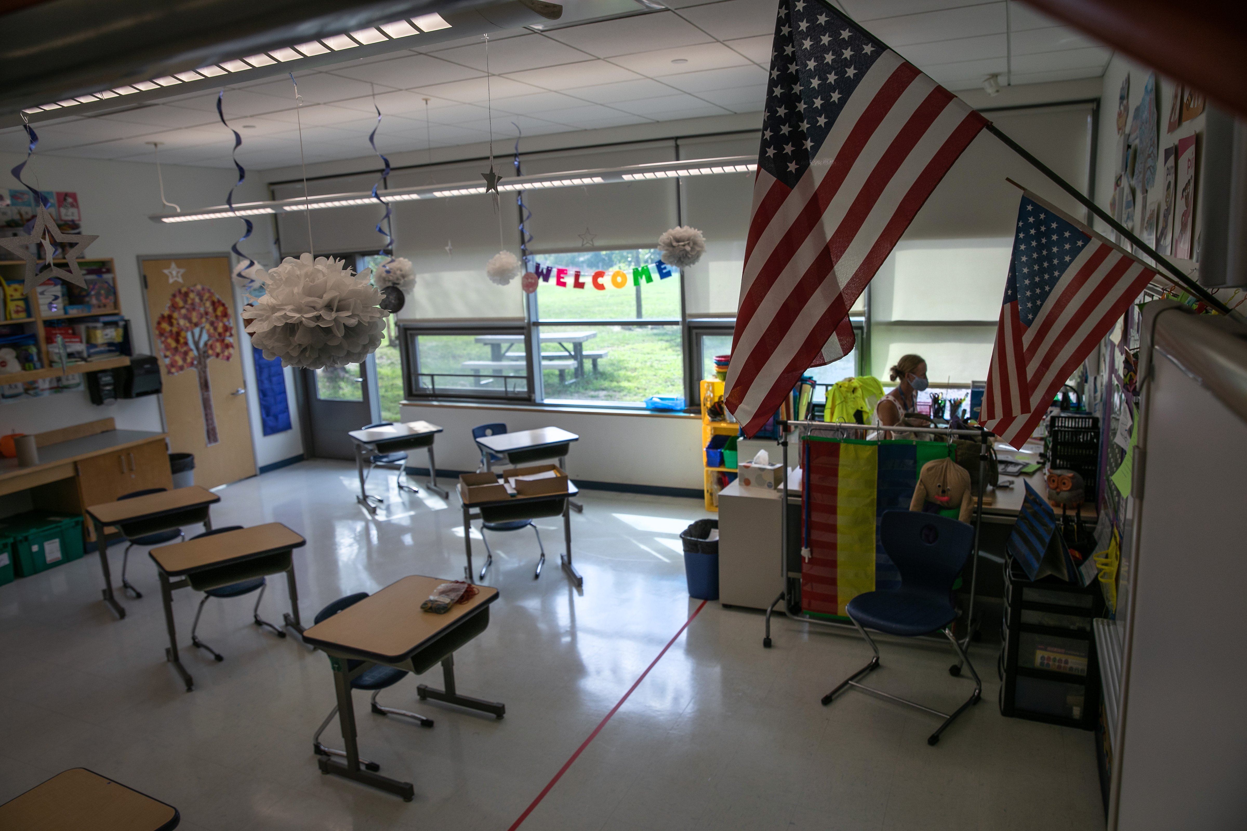 Desks sit socially distanced in a kindergarten classroom ahead of the fall semester at Rogers International School on Sept. 3, in Stamford, Conn. (John Moore—Getty Images)