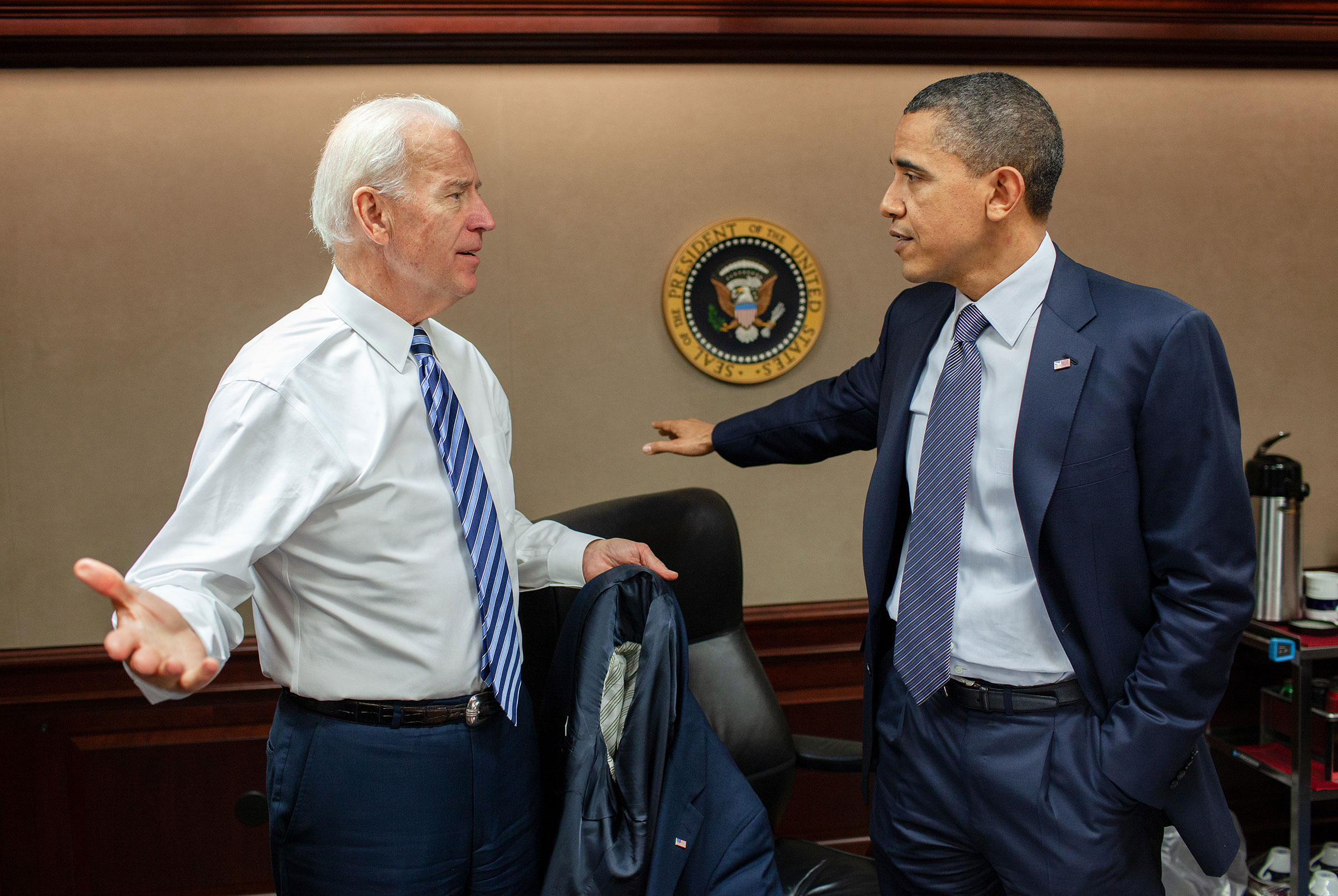 President Barack Obama, with Vice President Joe Biden, holds a secure teleconference call on Libya in the Situation Room of the White House, on April 5, 2011.