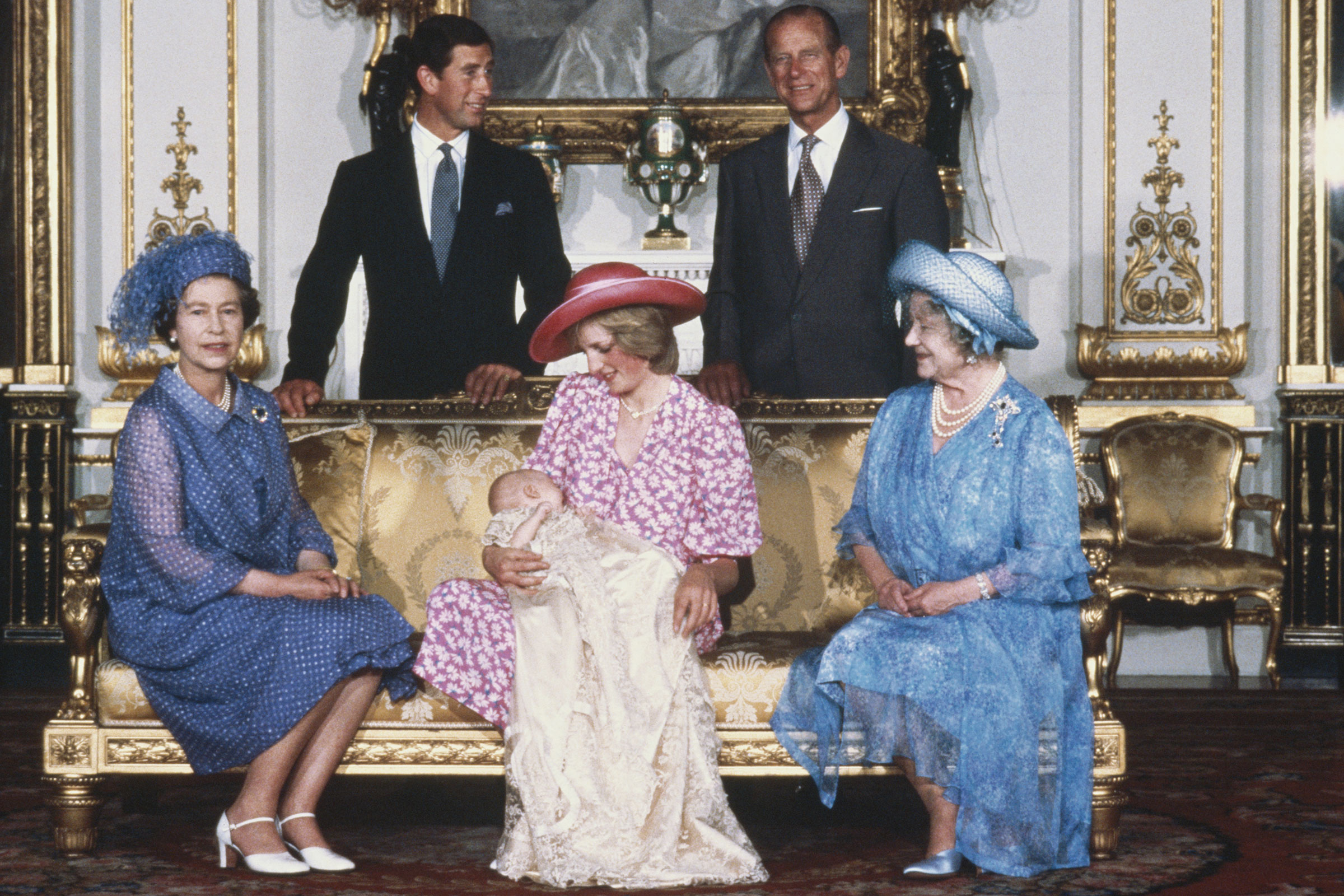 Diana, Princess of Wales holding her son Prince William with Charles, Prince of Wales, Prince Philip the Duke of Edinburgh, Queen Elizabeth II and Queen Elizabeth the Queen Mother at Buckingham Palace after Prince William's christening ceremony on Aug. 4, 1982. (Tim Graham Photo Library/Getty Images)