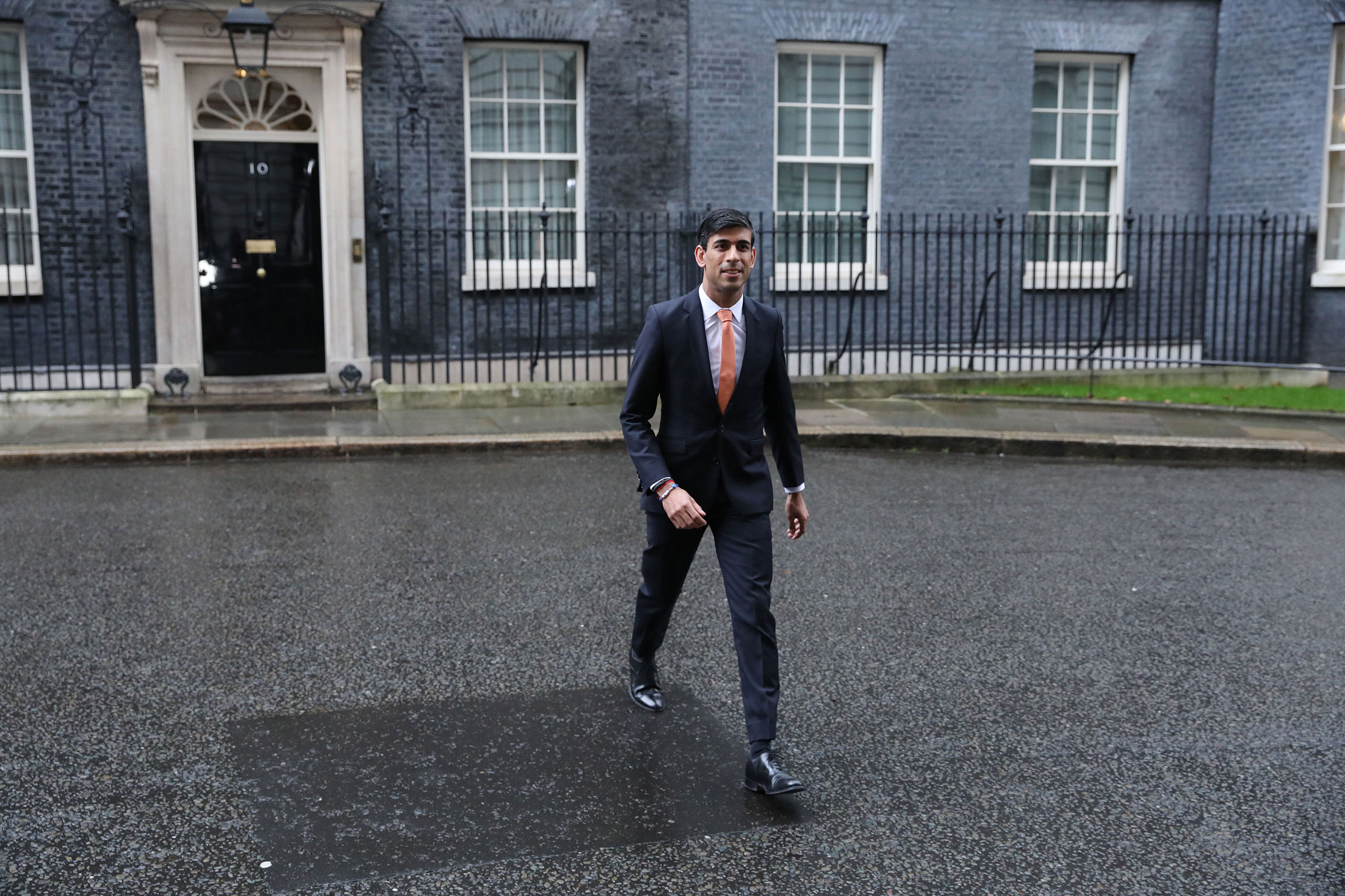 TIME 100 Next 2021: Britain's newly appointed Chancellor of the Exchequer Rishi Sunak leaves 10 Downing Street in central London on February 13, 2020 after recieving his new role at the Treasury. - Britain's prime minister revamped his top team on February 13 in his first cabinet reshuffle since taking Britain out of the European Union. (Photo by ISABEL INFANTES / AFP) (Photo by ISABEL INFANTES/AFP via Getty Images)