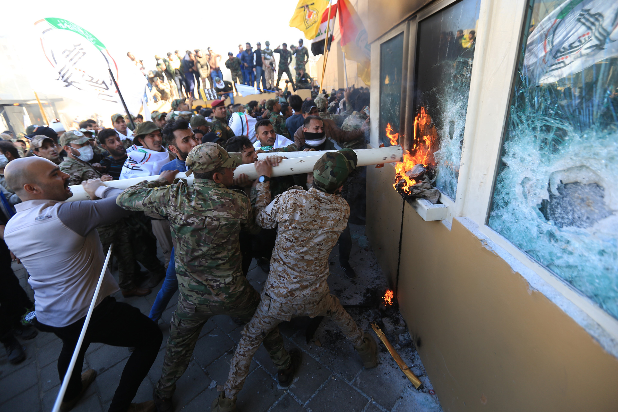 Iraqi protesters storm the U.S. embassy in Baghdad on Dec. 31, 2019. (Murtadha Sudani—Anadolu Agency/Getty Images)