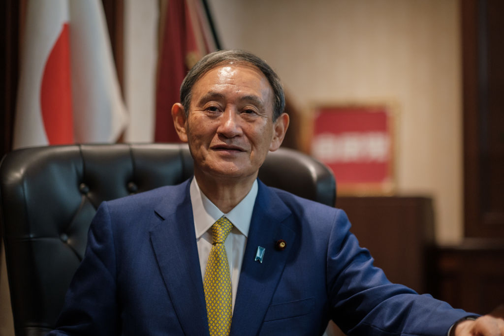 Yoshihide Suga poses for a portrait following a press conference after being elected the president of the Liberal Democratic Party (LDP) in Tokyo, Japan on Sept. 14, 2020. (Nicolas Datiche—Getty Images)
