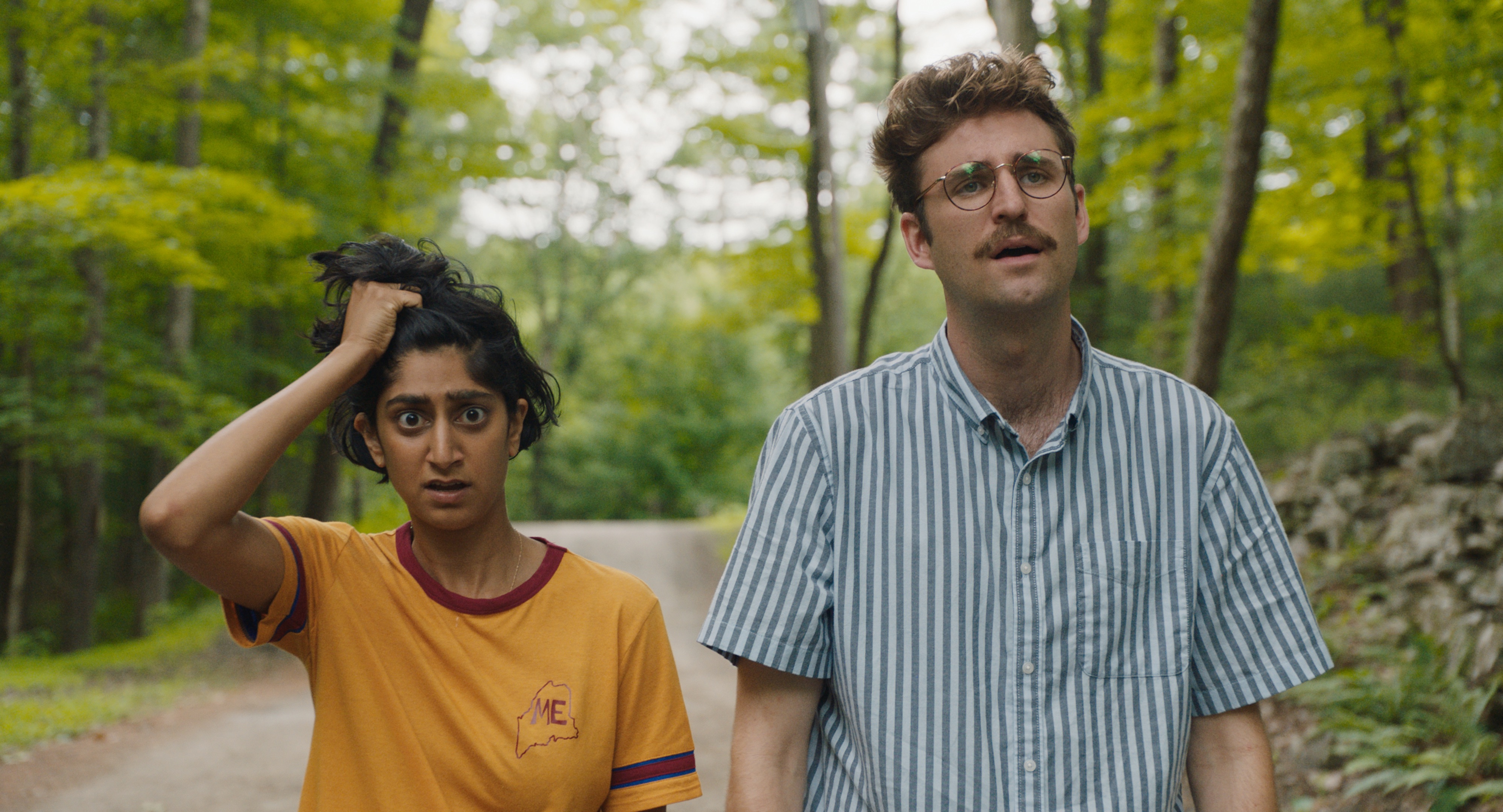 Sunita Mani and John Reynolds in 'Save Yourselves!' (Courtesy of Bleecker Street)
