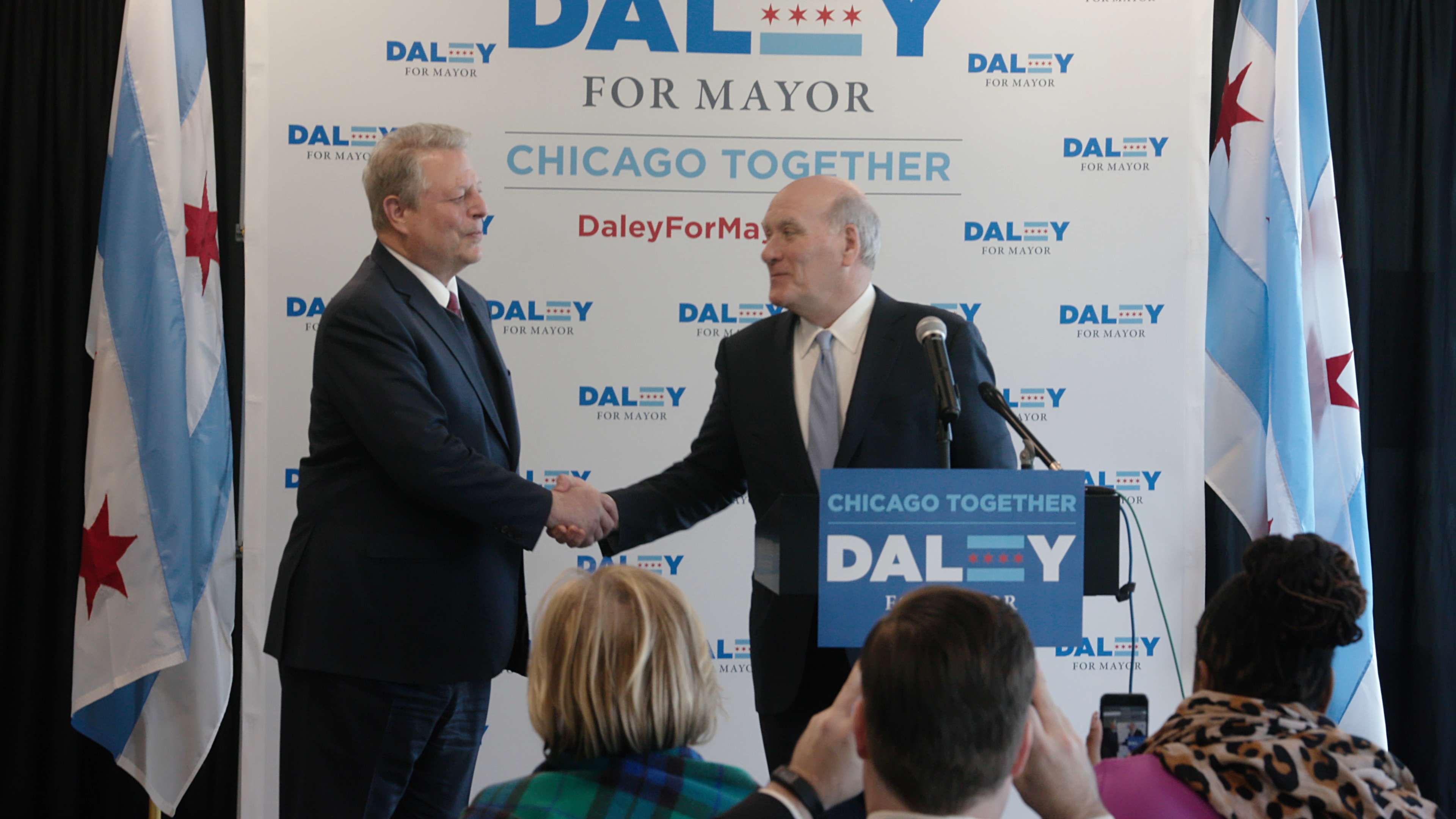 Al Gore and Bill Daley shake hands at a Daley campaign event. (Chicago Story Film, LLC) (Chicago Story Film, LLC)