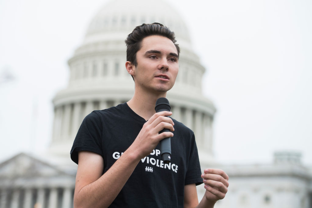 David Hogg, a survivor of the Marjory Stoneman Douglas High School shooting in Parkland, Fla., speaks on the East Front of the Capitol during a rally to organize letters to be delivered to congressional offices calling for an expansion of background checks on gun purchases in Washington, DC, on March 25, 2019. (Tom Williams—CQ Roll Call/Getty Images)