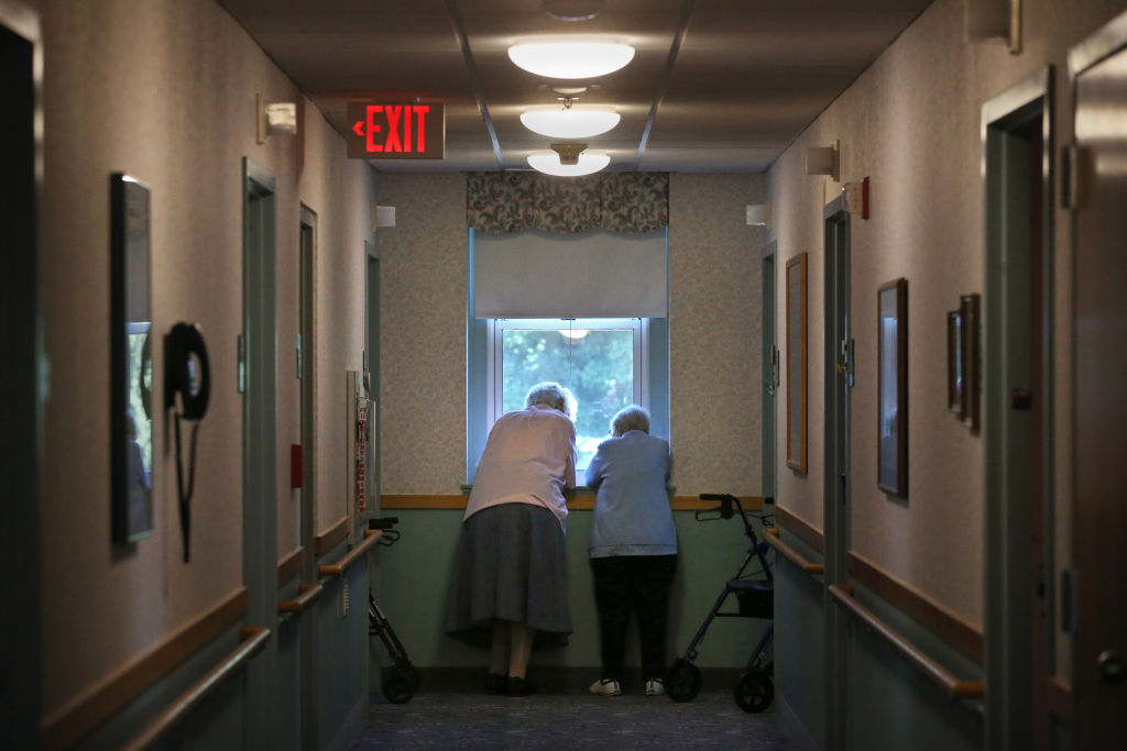 Nursing homes and long-term care facility residents, like these women photographed in Marlborough, Mass., in August, are particularly vulnerable to COVID-19. (Craig F. Walker—The Boston Globe/Getty Images)