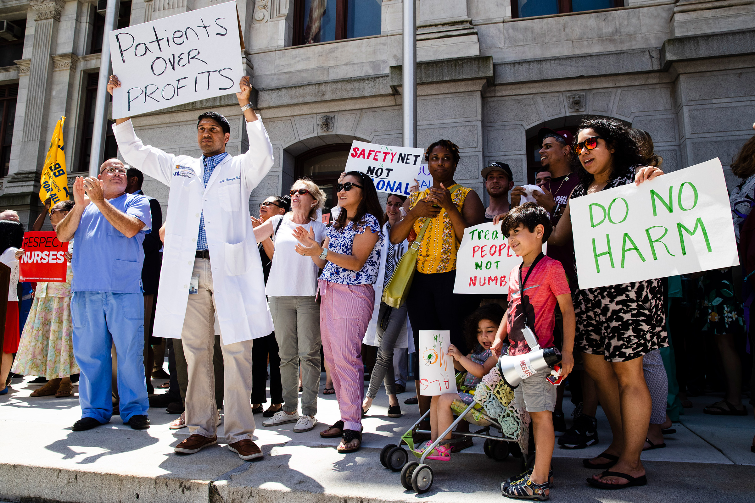 Protesters demonstrate against the planned closure of Hahnemann University Hospital, at City Hall in Philadelphia, June 27, 2019 (Matt Rourke—AP)