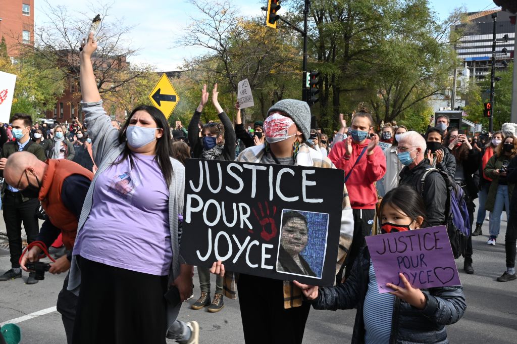 Protesters gather during a demonstration in central Montreal on October 3, 2020, to demand action for the death of Joyce Echaquan, a Canadian indigenous woman subjected to live-streamed racist slurs by hospital staff before her death. (Eric Thomas—AFP)