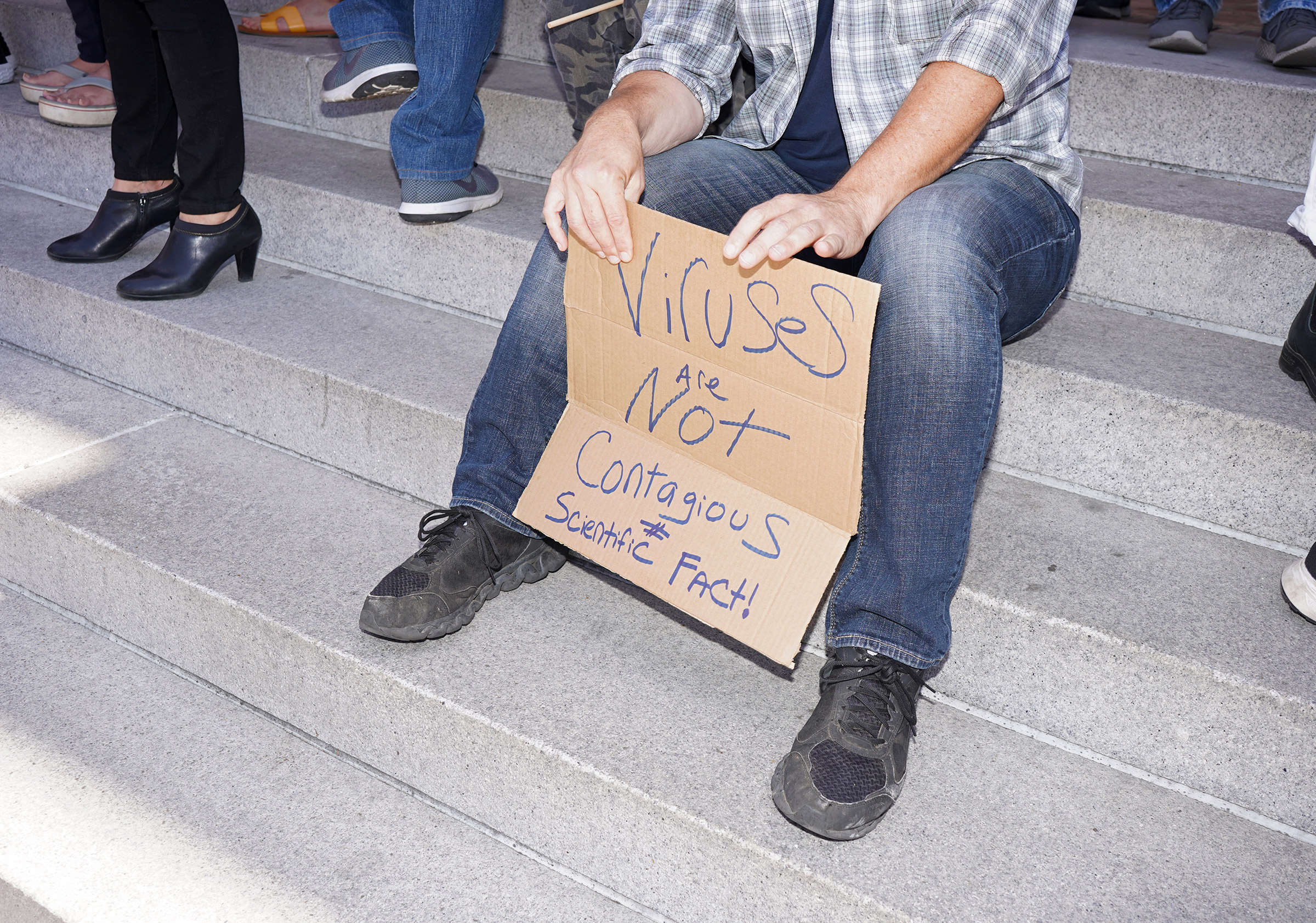 A protestor's sign at a rally calling for the reopening of California from coronavirus lockdown measures in Los Angeles, May 24, 2020. (Jamie Lee Curtis Taete)