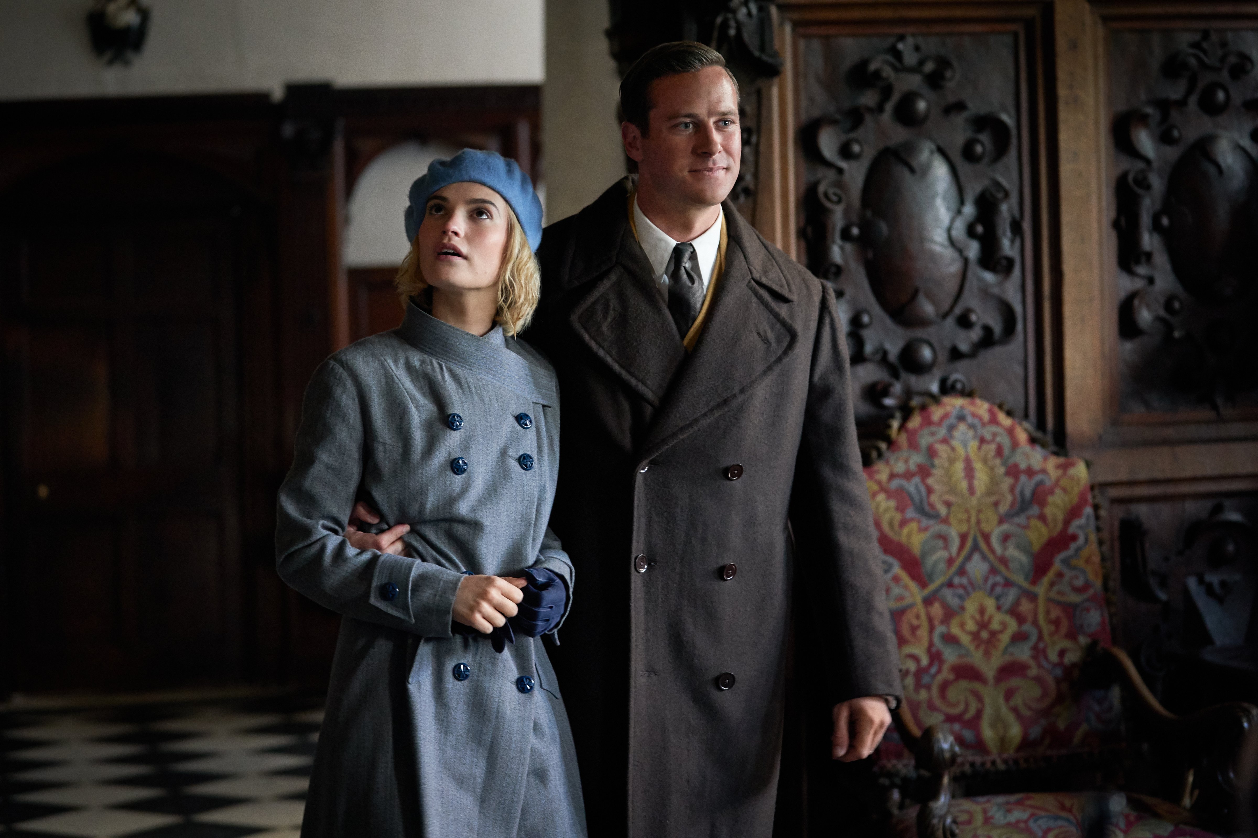 Lily James and Armie Hammer are a newly married couple haunted by the ghost of his late wife (Kerry Brown / Netflix—2020 © Netflix, Inc.)