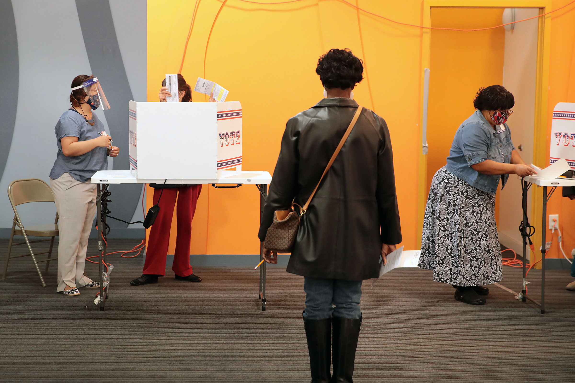 Residents vote at a polling place in the Midtown neighborhood in Milwaukee, Wisconsin on Oct. 20, 2020. (Scott Olson—Getty Images)