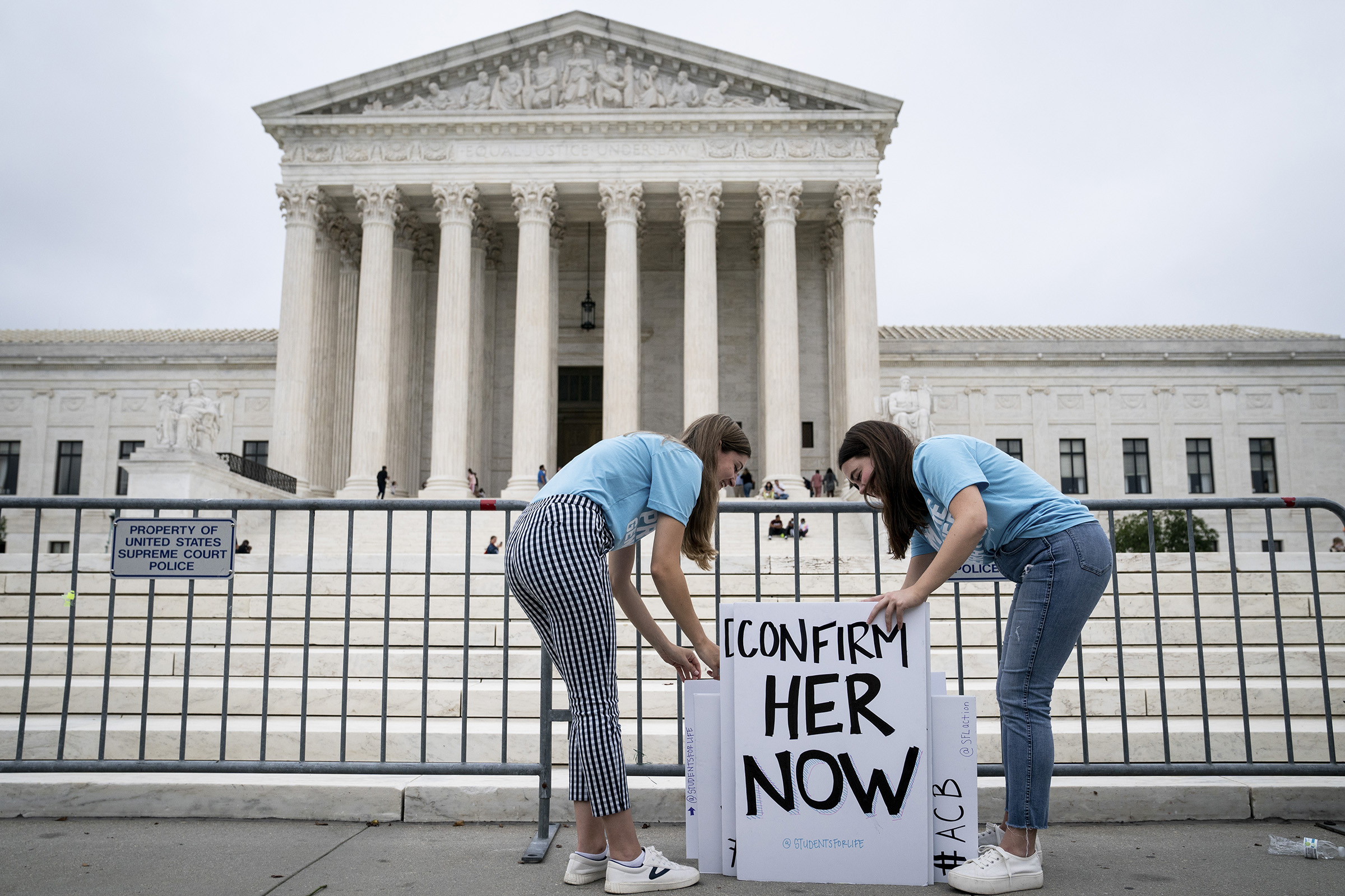 Liberty University students with signs in support of the nomination of Judge Amy Coney Barrett outside the Supreme Court in Washington, on Sept. 26, 2020. (Erin Schaff—The New York Times/Redux)