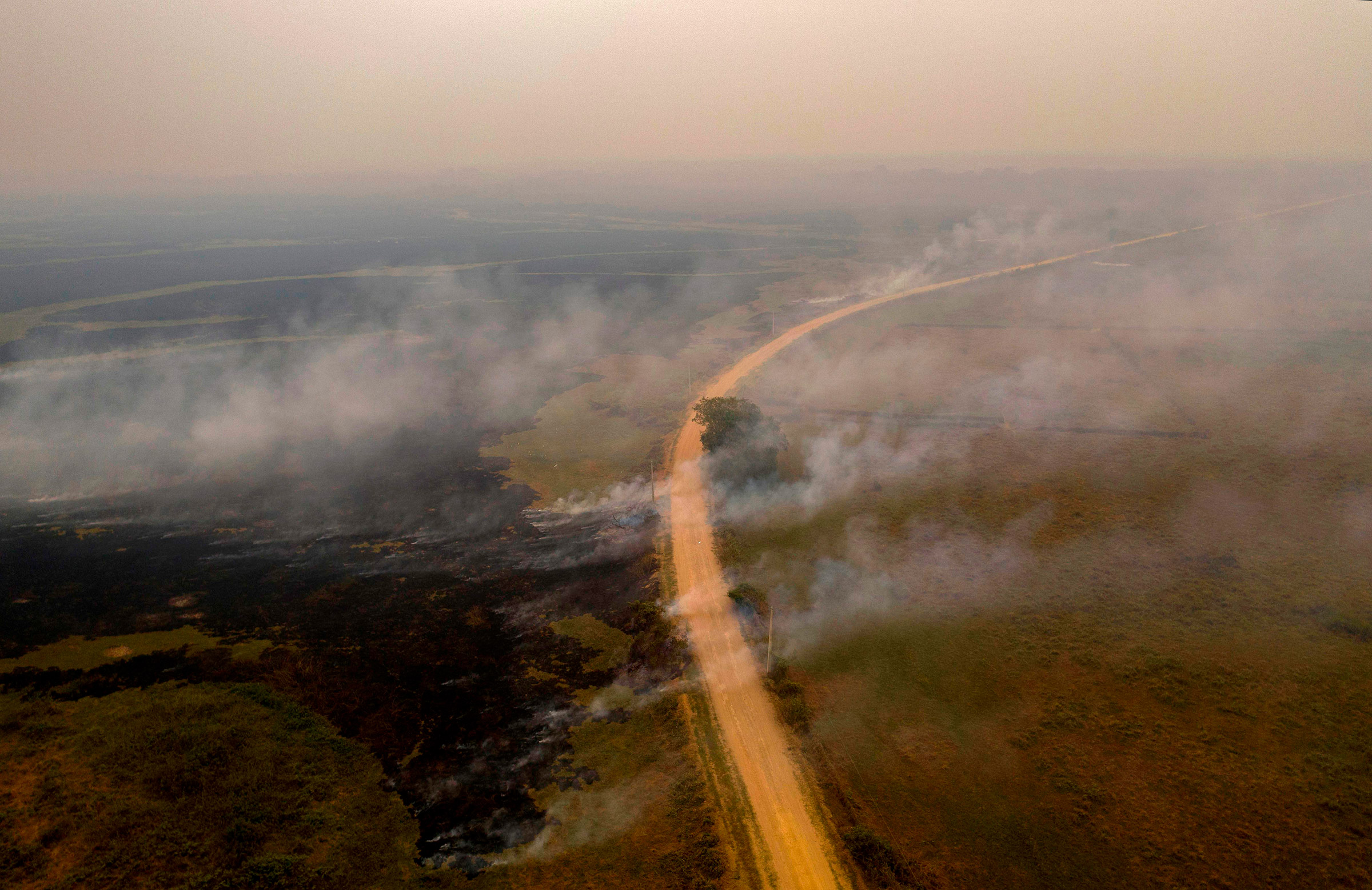 Smoke billows from fires near the Transpantaneira road on Sept. 14.