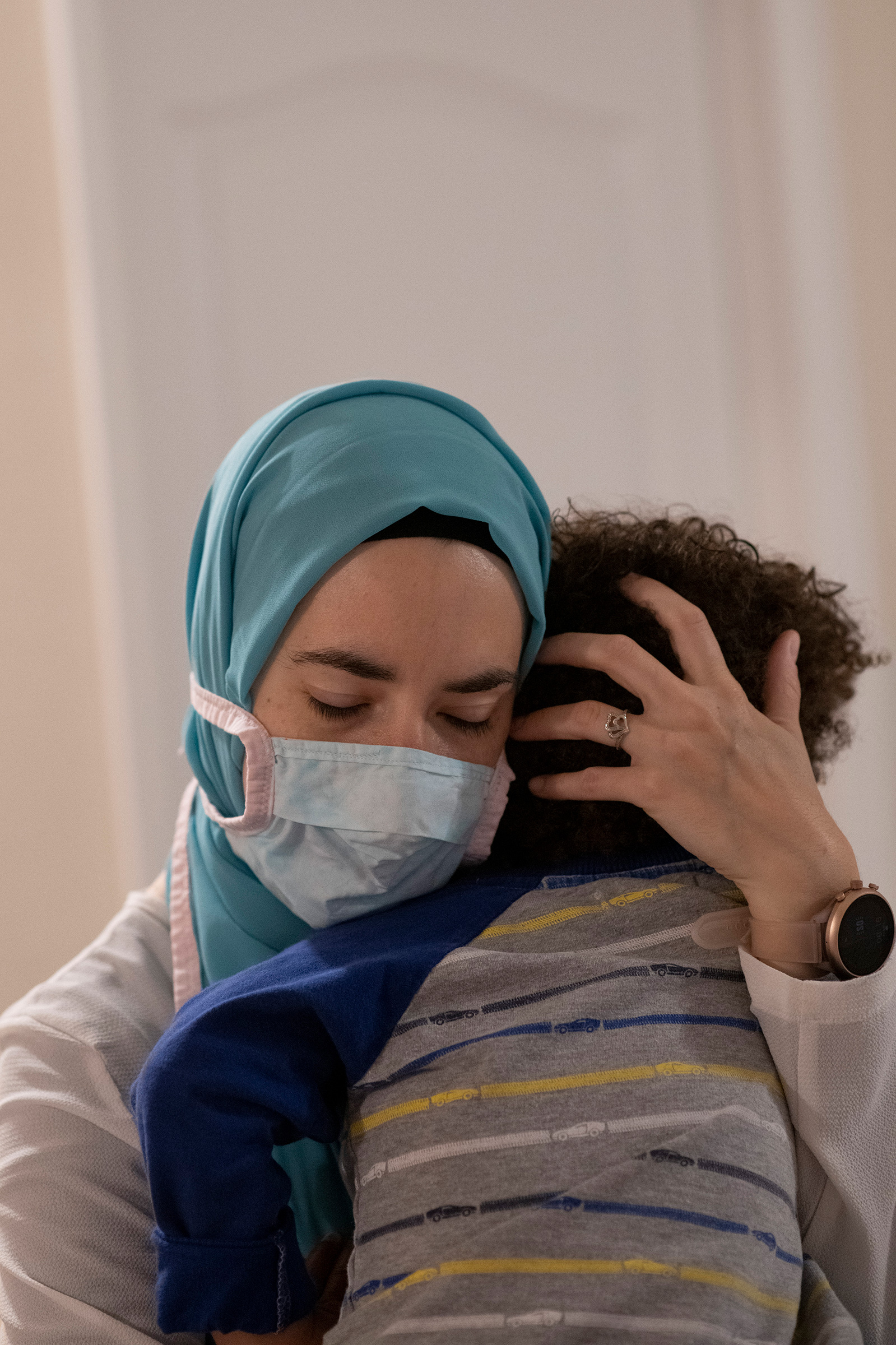 Brittany Schultz comforts her son, Gabriel, on Sept. 17