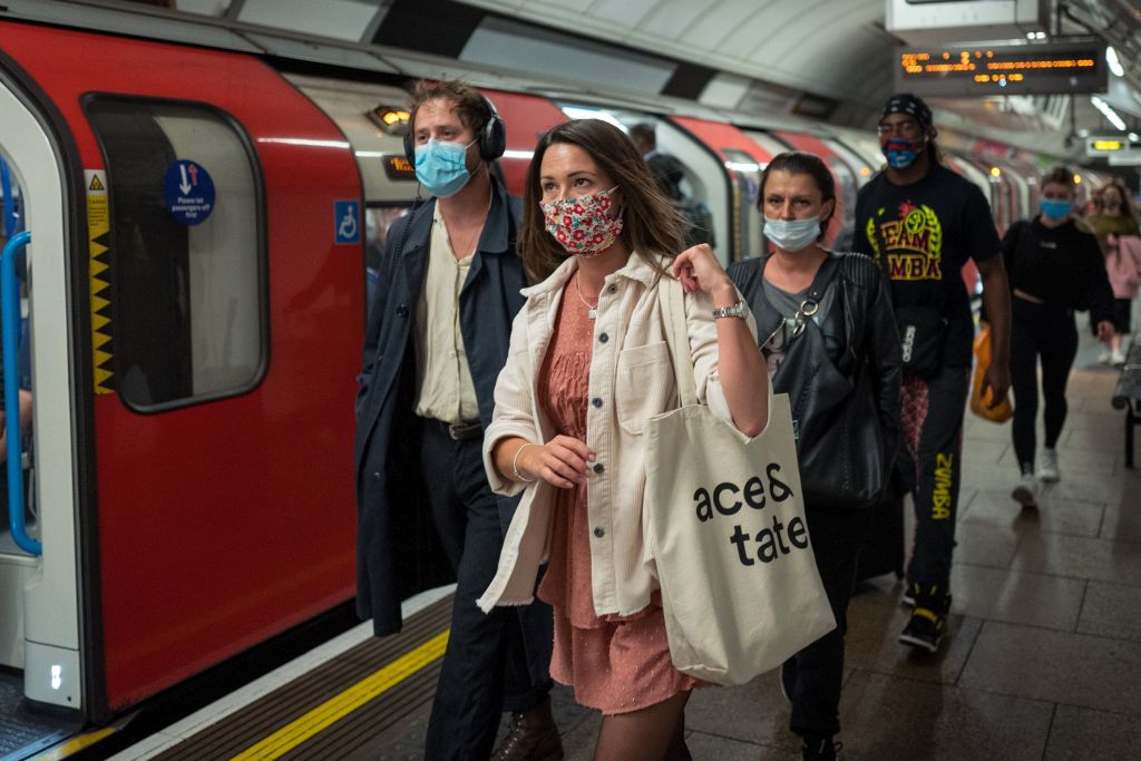 Commuters wearing protective face coverings travel on Victoria line at rush hour in central London on September 23, 2020. (Tolga Akmen—AFP/Getty Images)