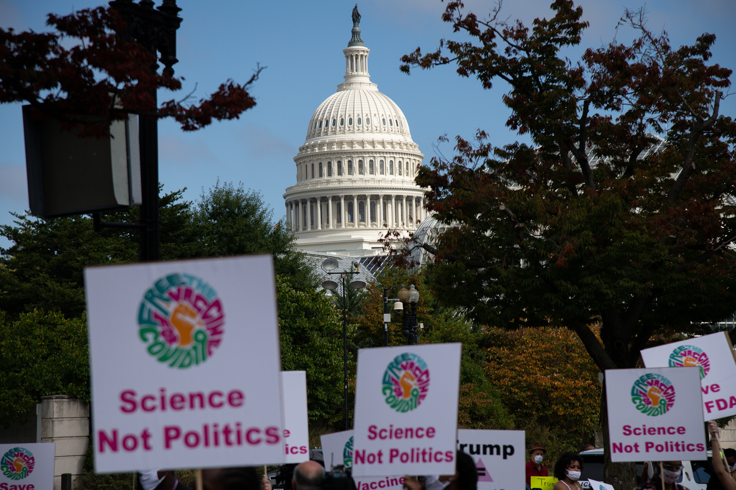 A view of the U.S. Capitol Building as demonstrators march to the Department of Health and Human Services (HHS) headquarters during a protest organized by groups calling for safe vaccines on Oct. 21