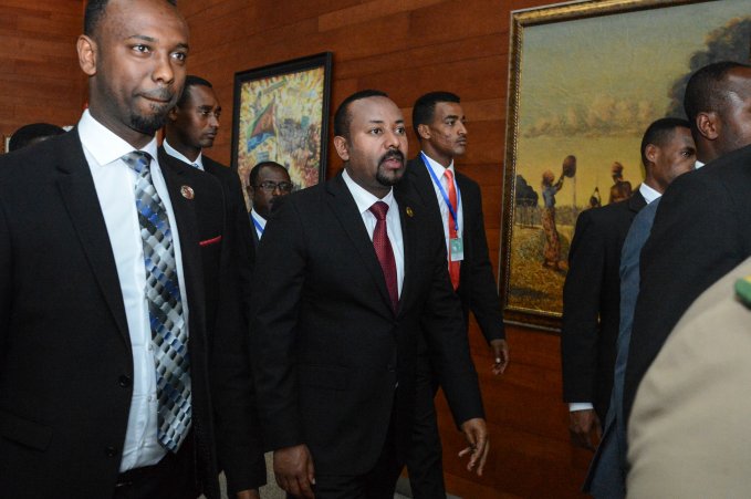 Ethiopia's Prime Minister Abiy Ahmed, center, arrives for the opening session of the 33rd African Union Summit in Addis Ababa on Feb. 9