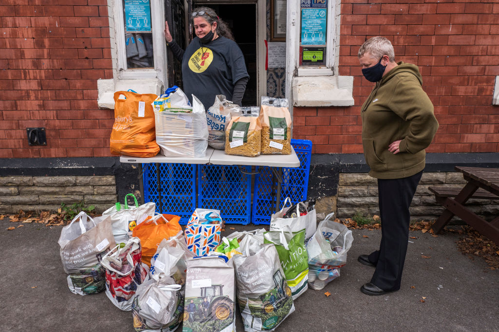 A food bank accepts a donation on October 20, 2020 in Ashton under Lyne, England. (Getty Images—2020 Anthony Devlin)