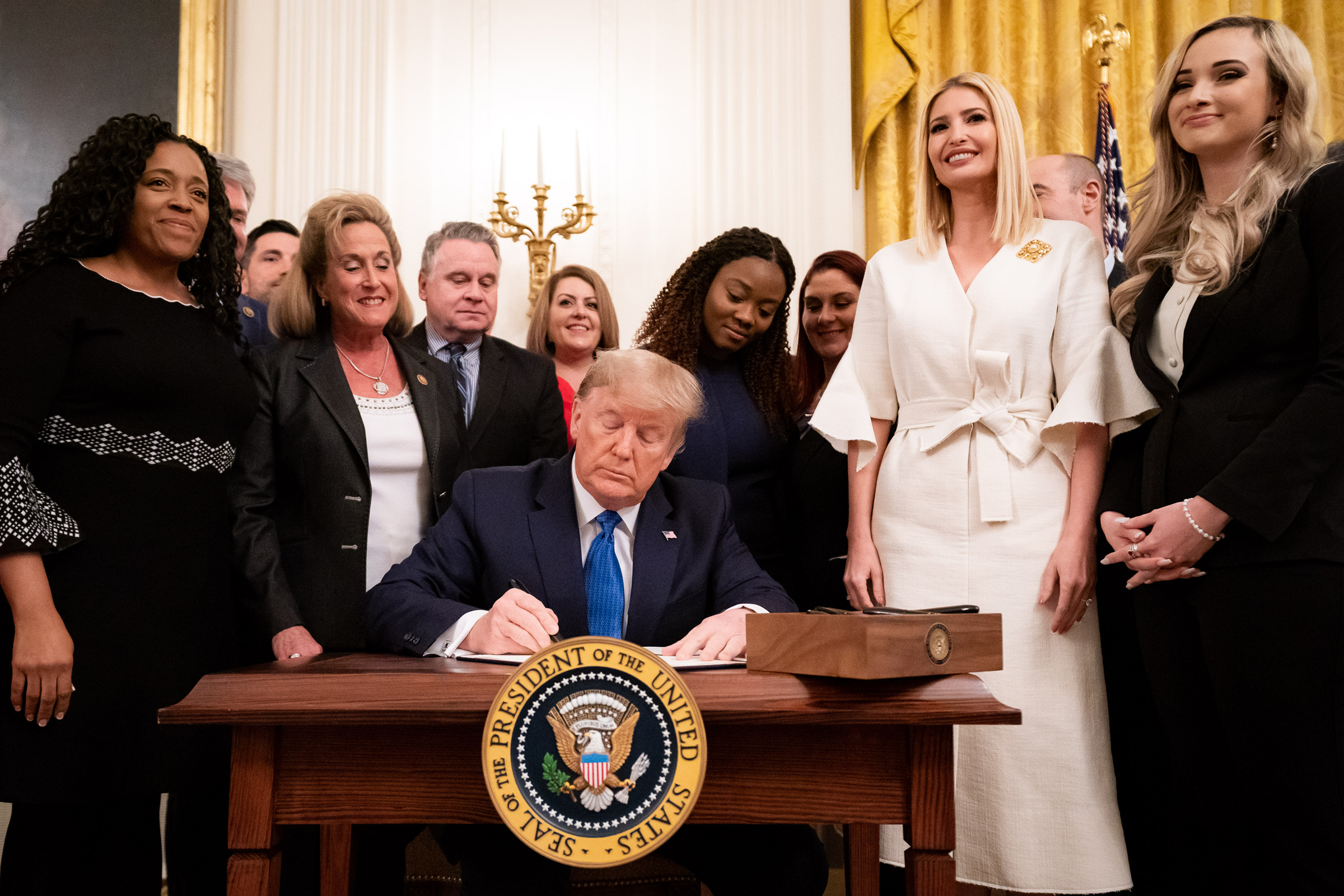 President Donald J. Trump signs an Executive Order for Combating Human Trafficking and Online Child Exploitation in the United States, at the White House Summit on Human Trafficking on Jan. 31, 2020. (Sipa)