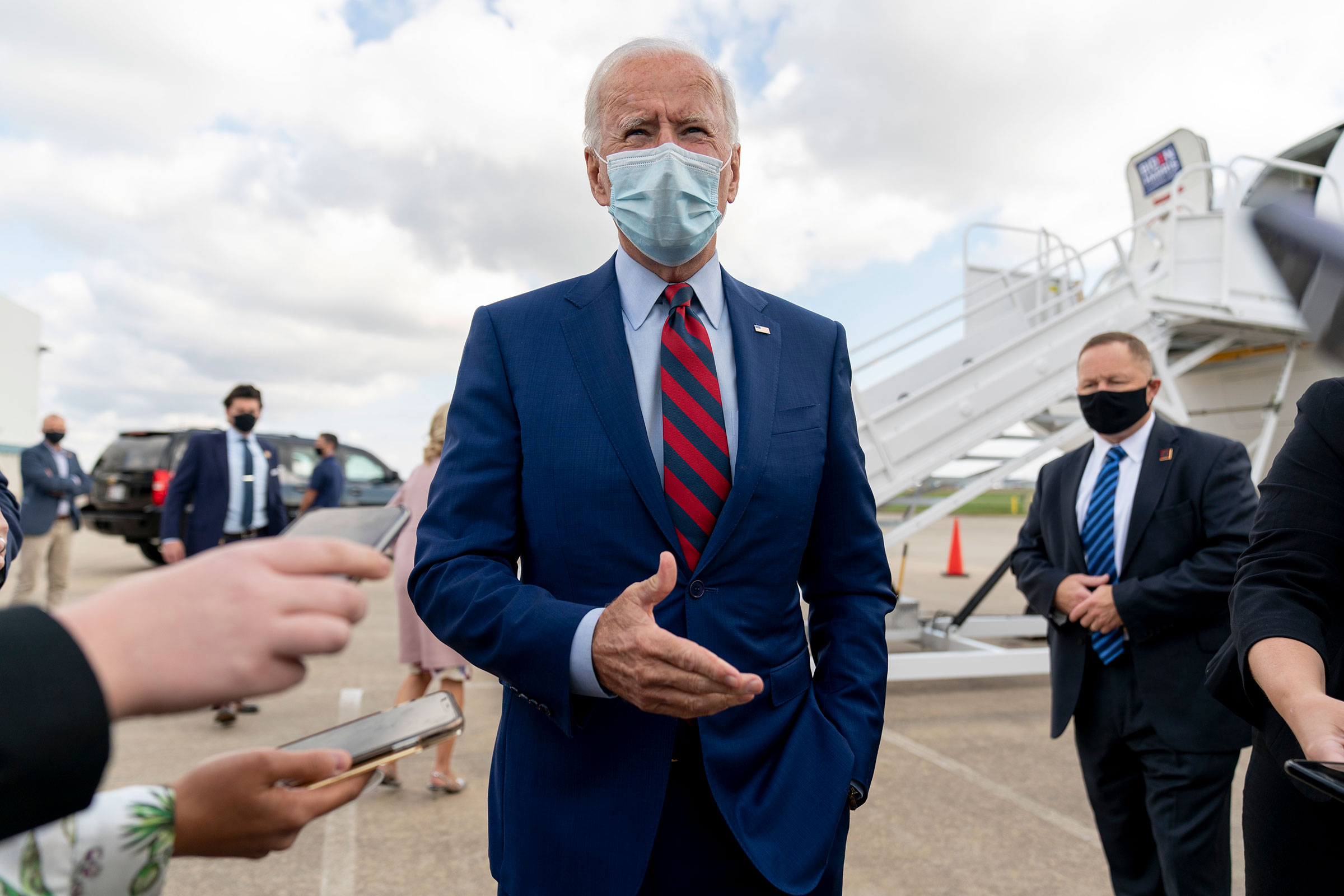 Democratic presidential candidate former Vice President Joe Biden speaks to member of the media before boarding his campaign plane at New Castle Airport in New Castle, Del., on Oct. 5, 2020. (Andrew Harnik—AP)