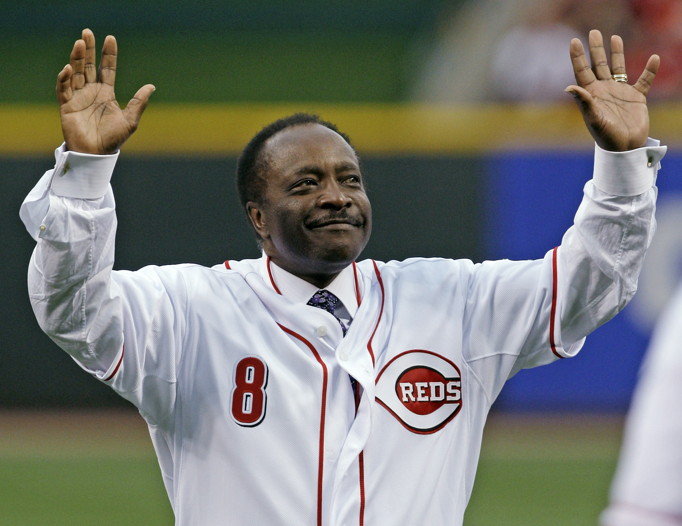 In this Wednesday, April 7, 2010, file photo, Cincinnati Reds Hall of Fame second baseman Joe Morgan acknowledges the crowd after throwing out a ceremonial first pitch prior to the Reds' baseball game against the St. Louis Cardinals, in Cincinnati. (Al Behrman--AP)