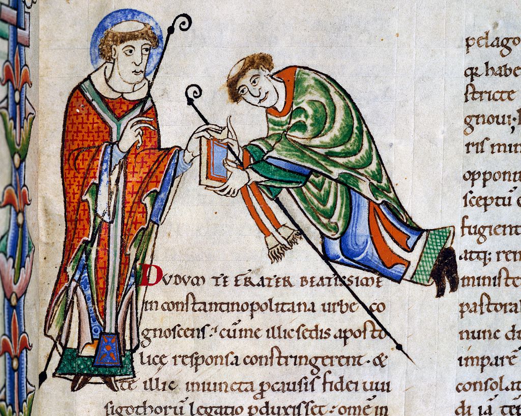 St. Gregory offering his book to Bishop Leandro, miniature from Commentary on the Book of Job, from the Abbey of Citeaux. France, 12th century. (De Agostini via Getty Images)