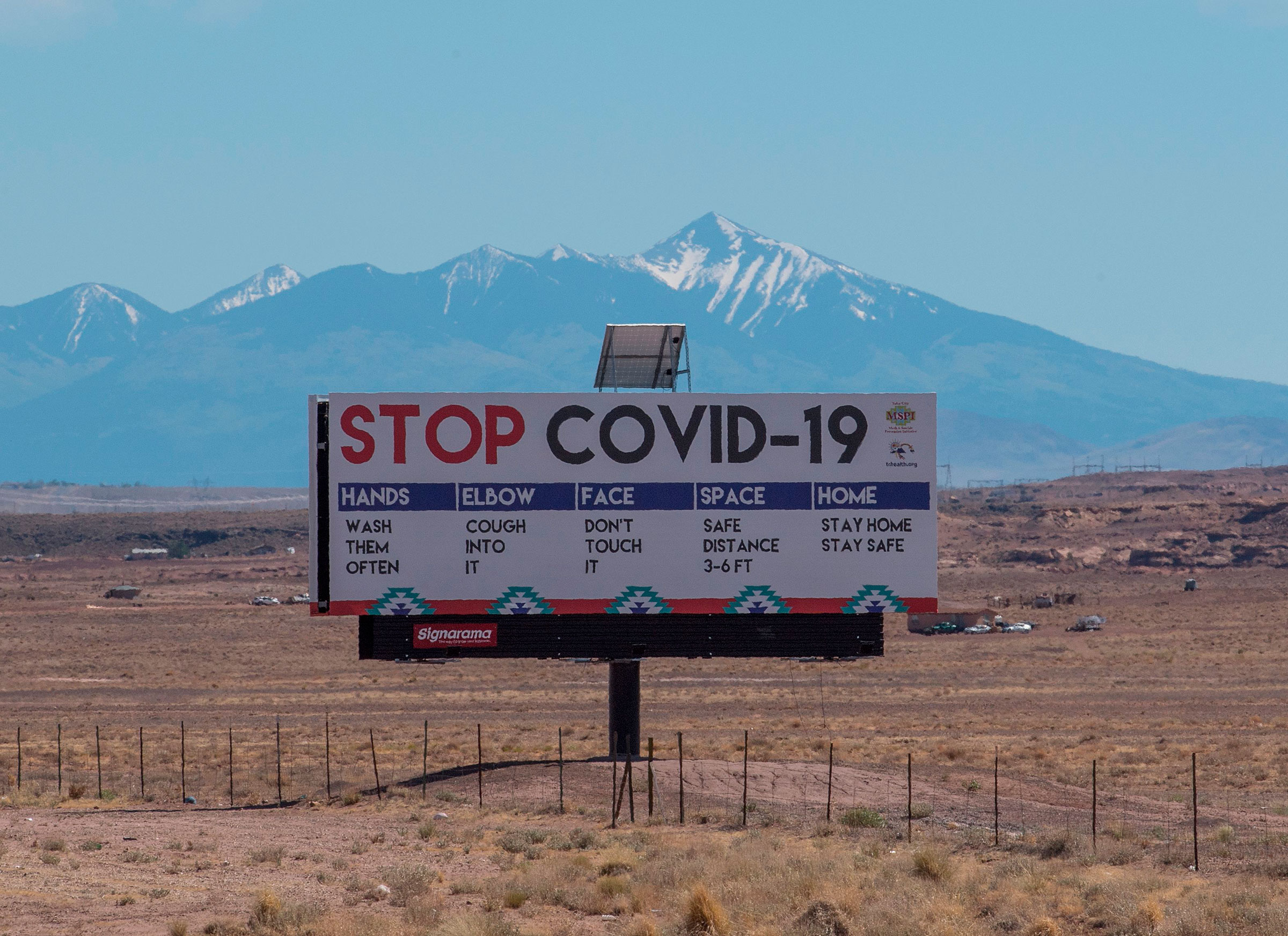 A sign warns against the Covid-19 virus near the Navajo Indian nation town of Tuba City, Arizona on May 24, 2020. (Mark Ralston—AFP via Getty Images)