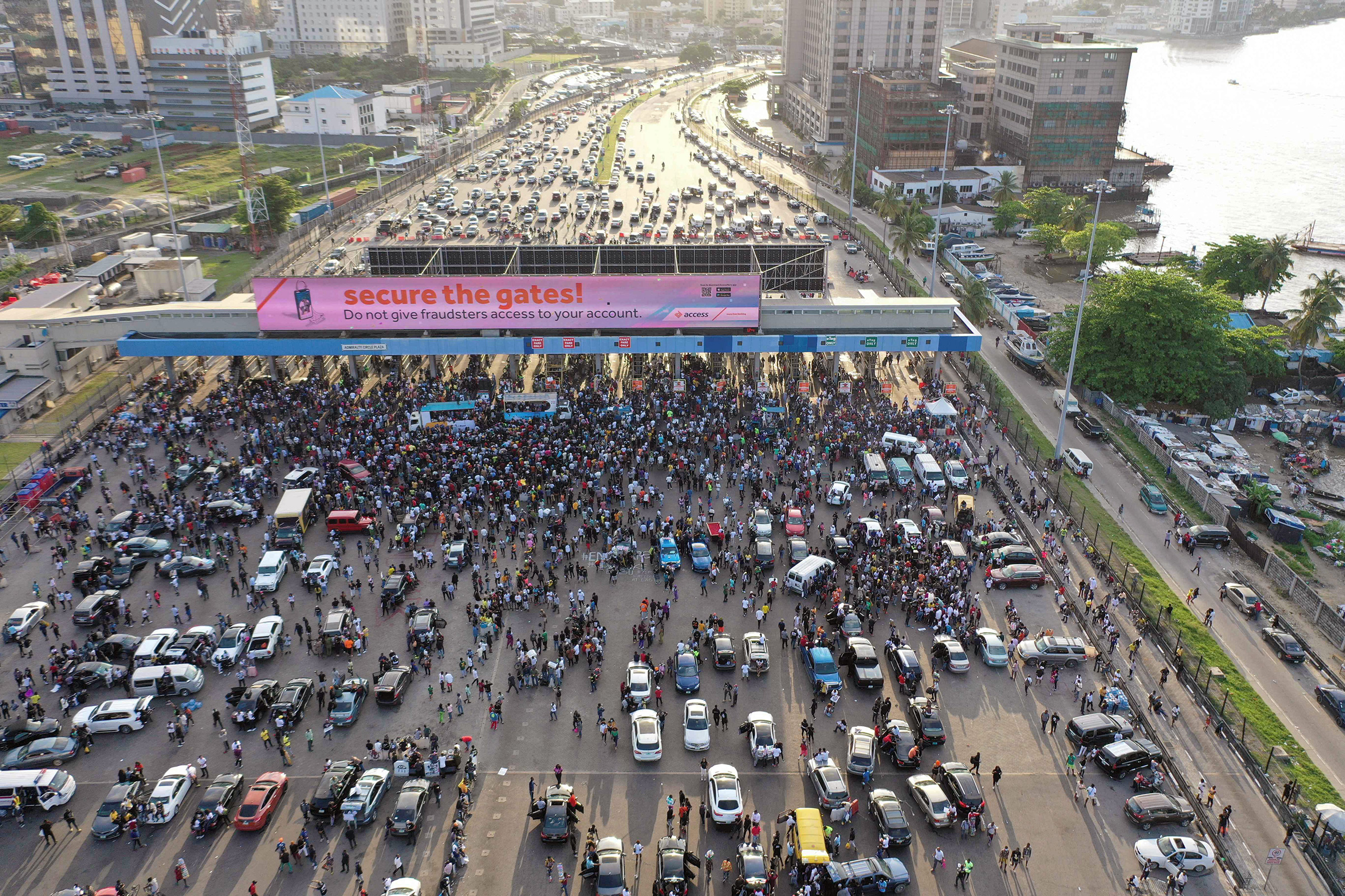 Protesters gather at Lagos' Lekki toll gate during a demonstration against police brutality on Oct. 15, 2020. (Pierre Favennec—AFP/Getty Images)