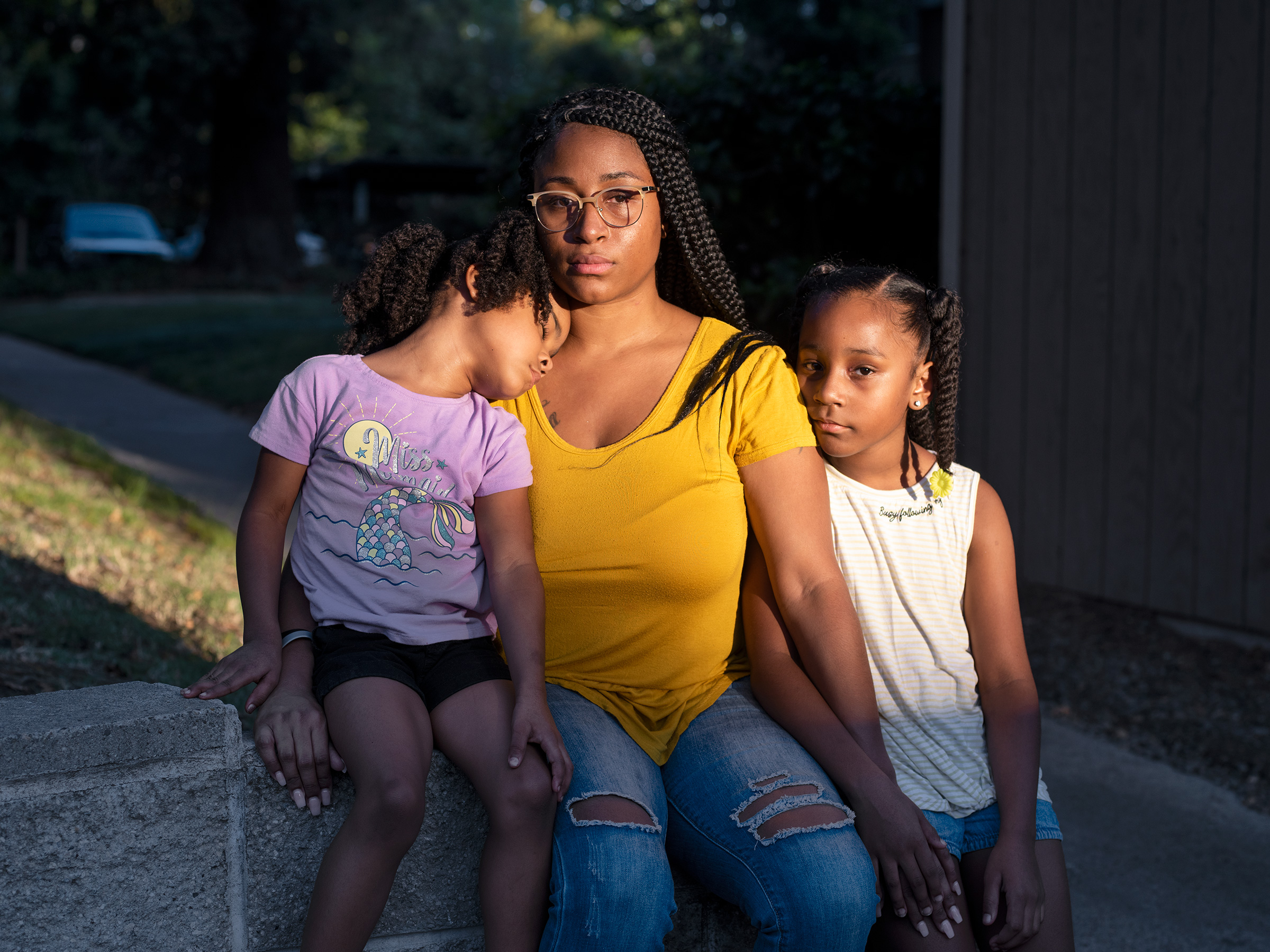 Love with her two daughters outside Sacramento on Oct. 4. (Andres Gonzalez for TIME)
