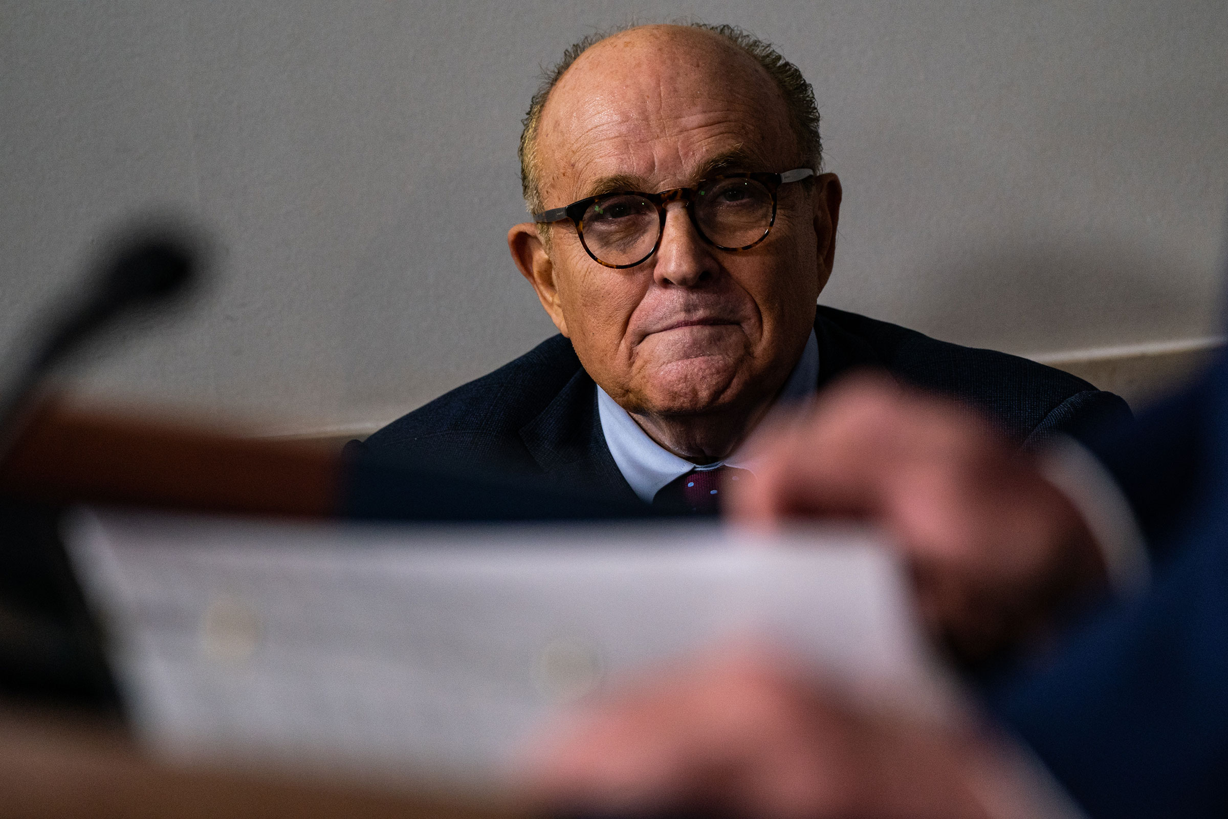 Rudy Giuliani listens as President Trump speaks during a news briefing at the White House in Washington, D.C., on Sept. 27, 2020. (Salwan Georges—The Washington Post/Getty Images)