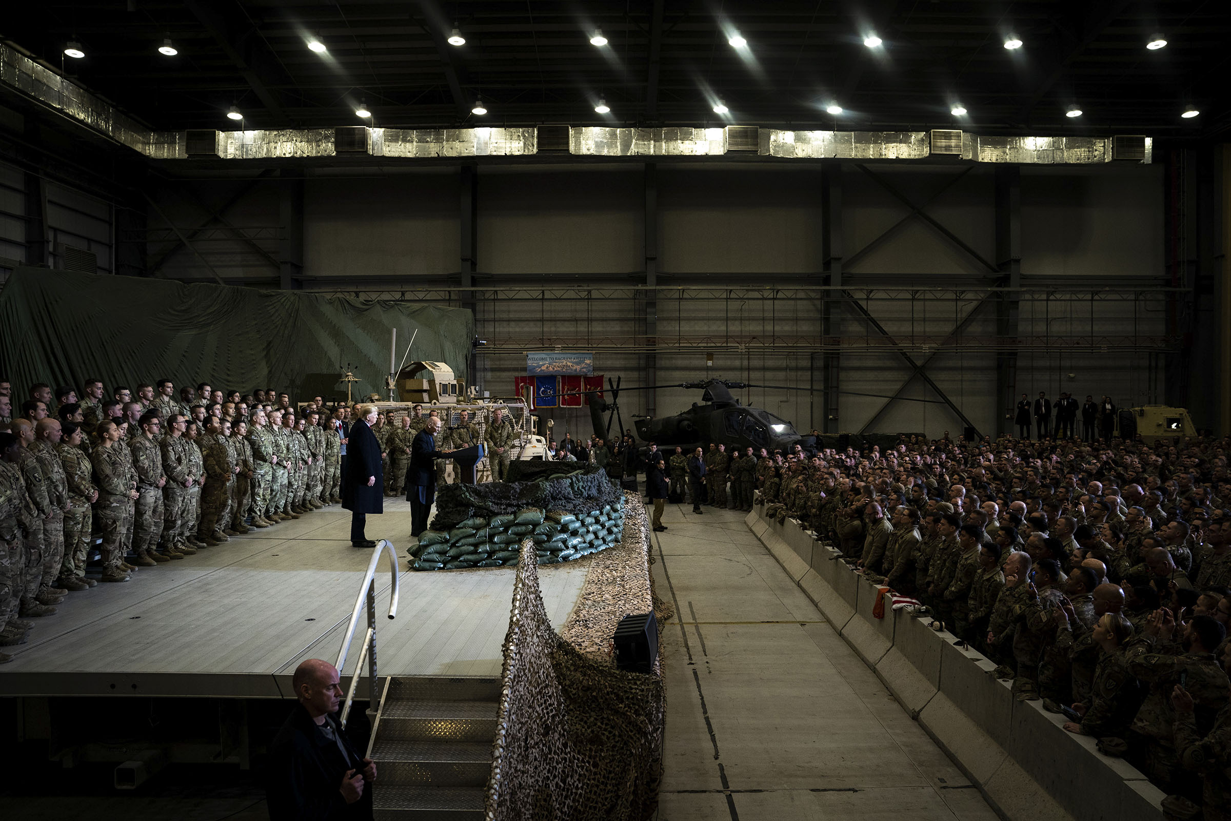 President Donald Trump and President Ashraf Ghani of Afghanistan address American troops at Bagram Air Base outside of Kabul, Afghanistan, on Nov. 28, 2019. (Erin Schaff—The New York Times/Redux)