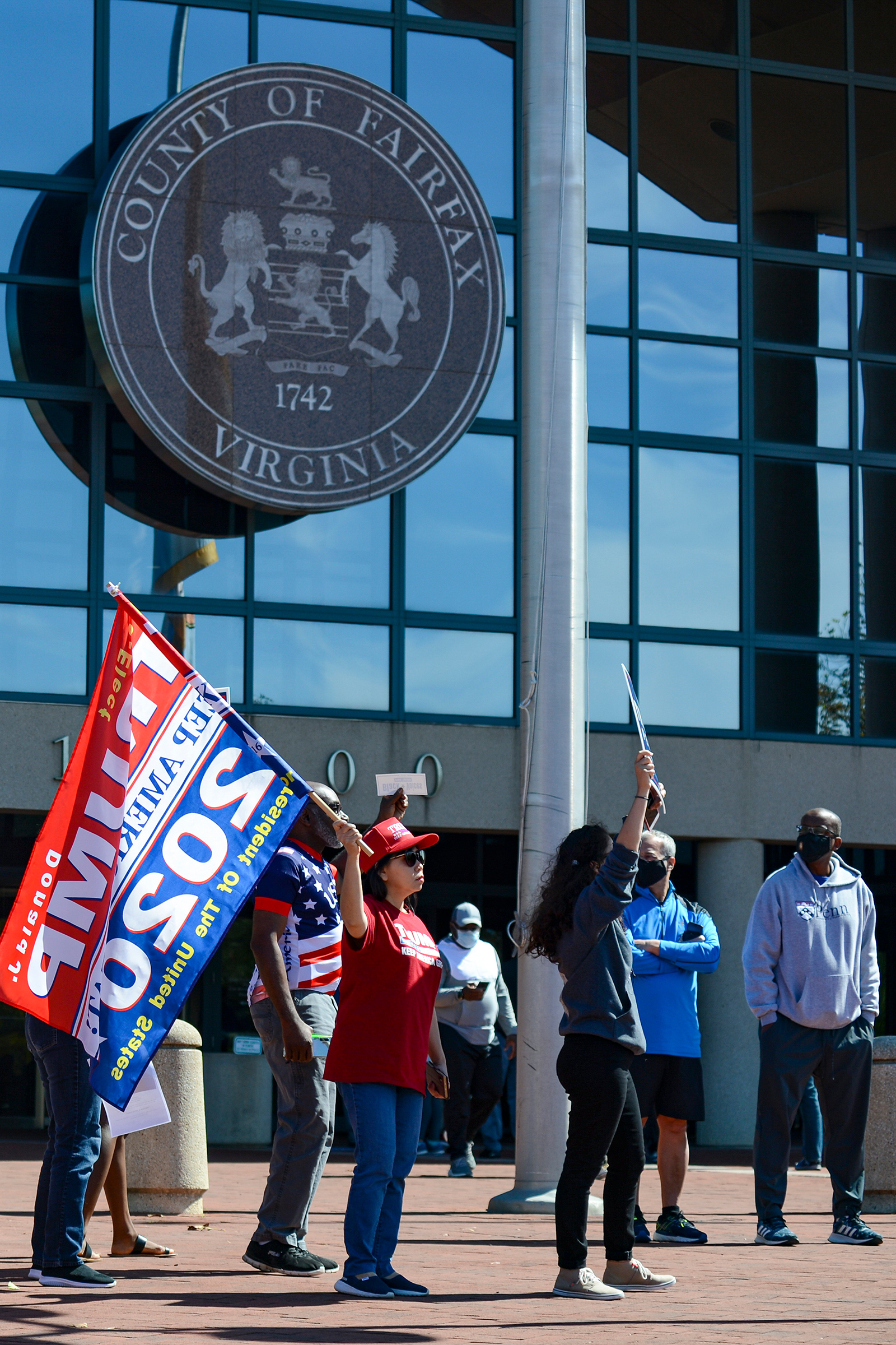 Trump supporters chant, “Four more years,” on Sept. 19 outside the Fairfax County Government Center in Fairfax, Va., disrupting early voting (Kenny Holston—The New York Times/Redux)